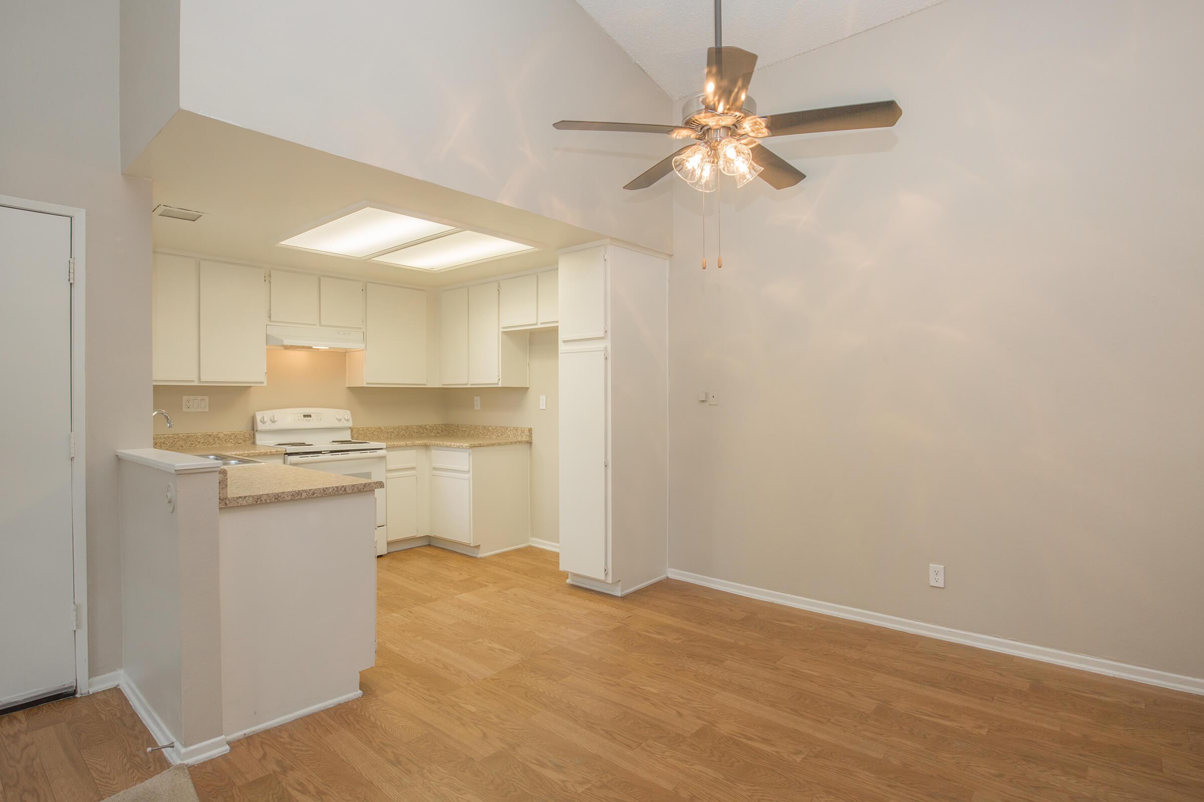 Kitchen and dining room with wooden floors