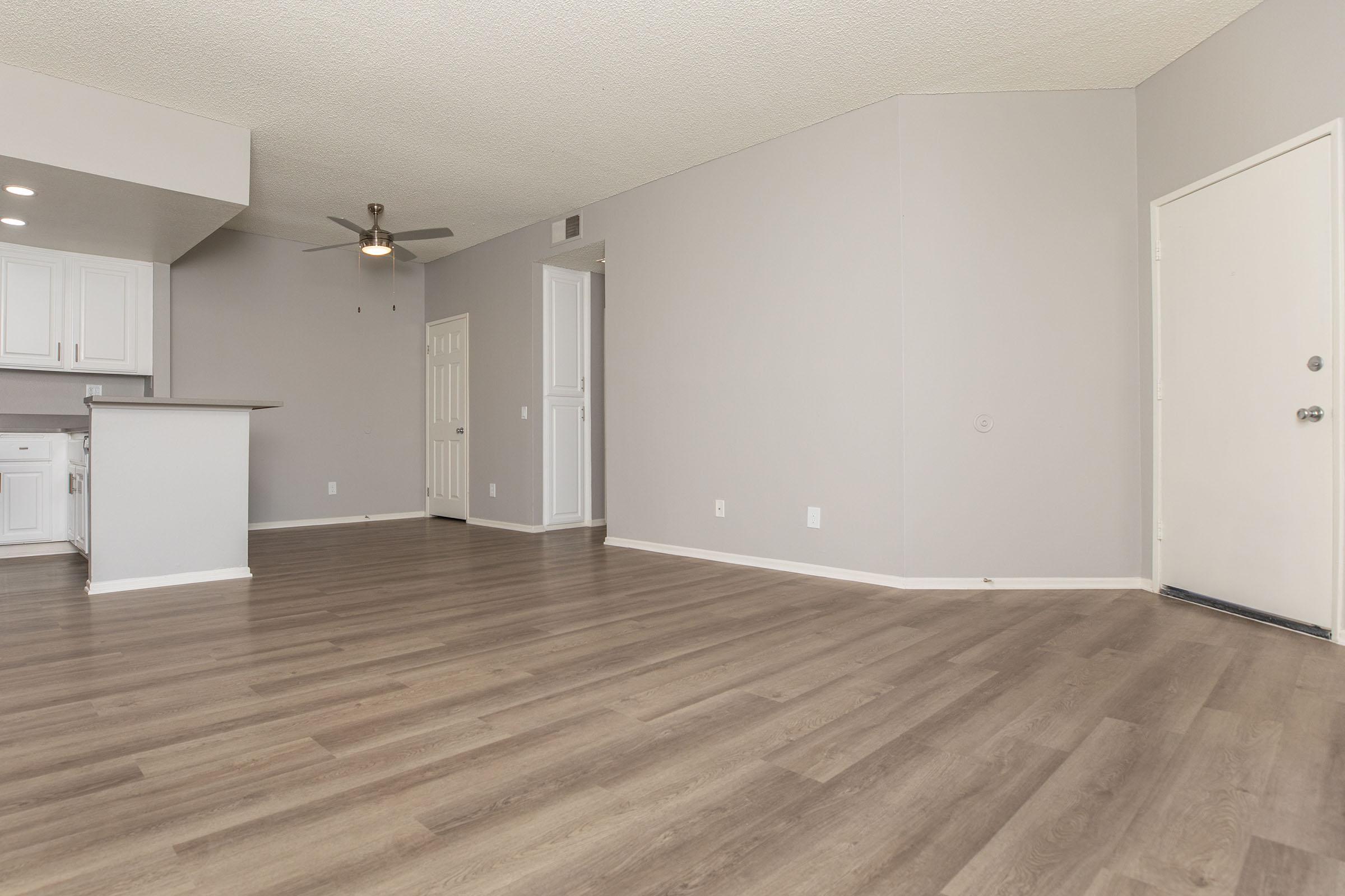 a kitchen with a wood floor