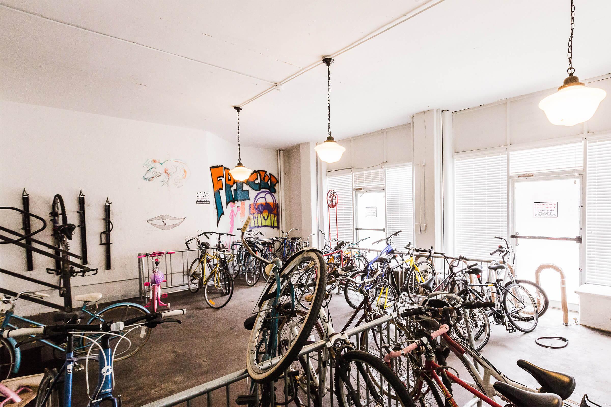 a bicycle leaning against a wall