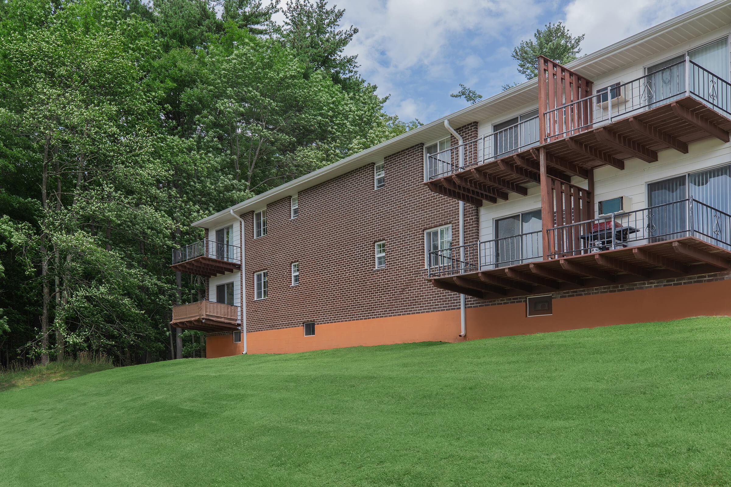 a large lawn in front of a building