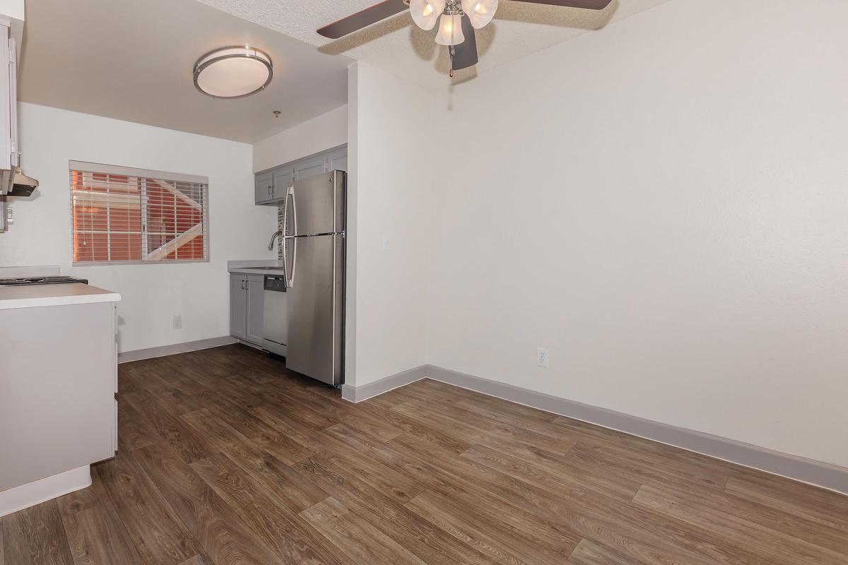 a kitchen with a wooden floor