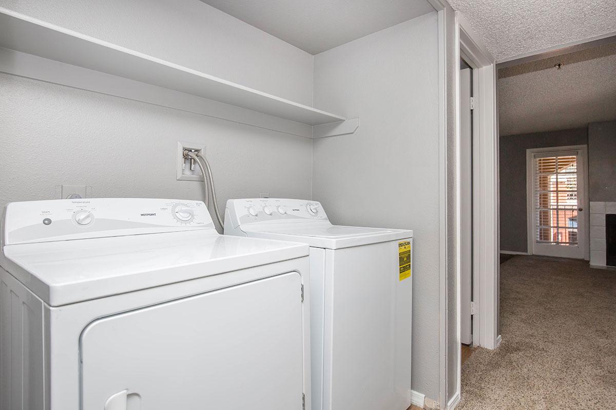 a white refrigerator freezer sitting in a room