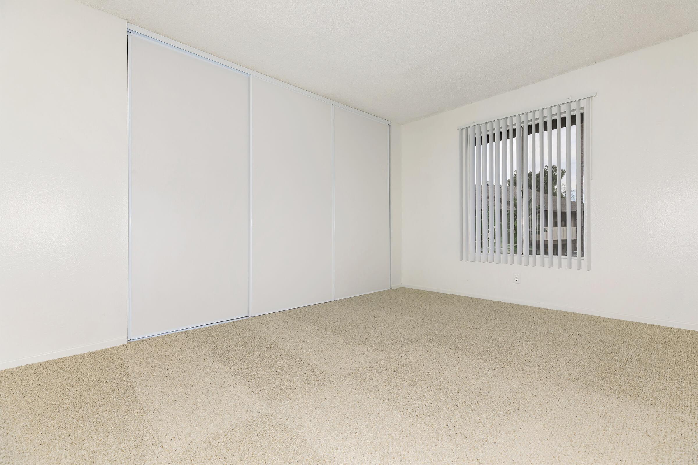 Unfurnished carpeted bedroom