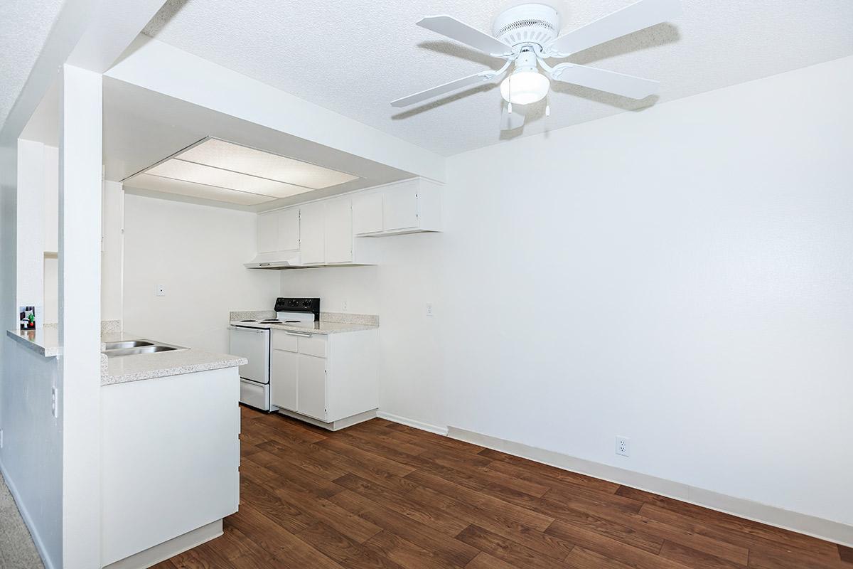 Kitchen and dining room with wooden floors