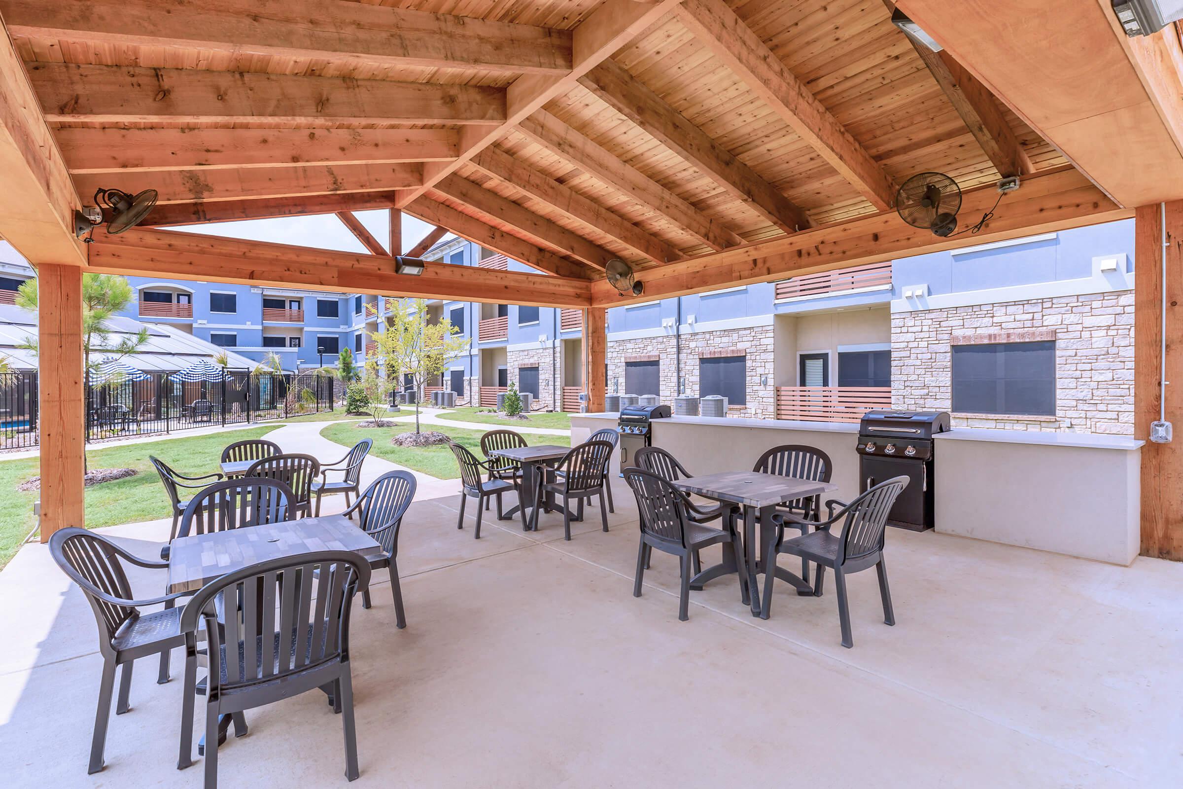 a dining room table in front of a building