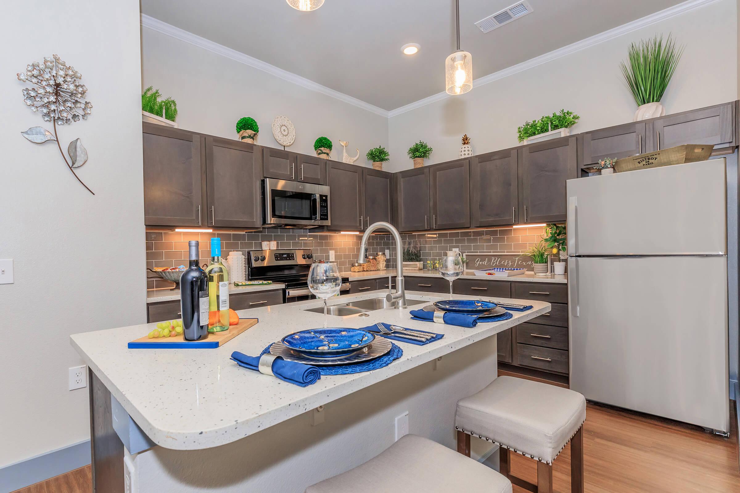 a kitchen with a sink and a window