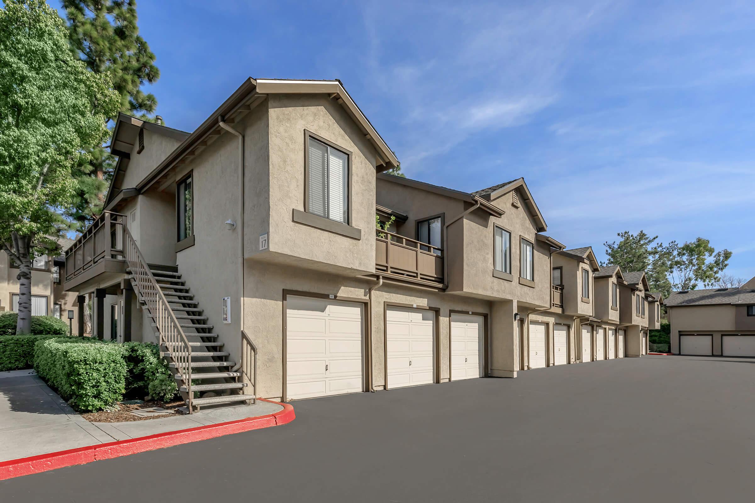 Spring Lakes Apartment Homes community building with attached garages