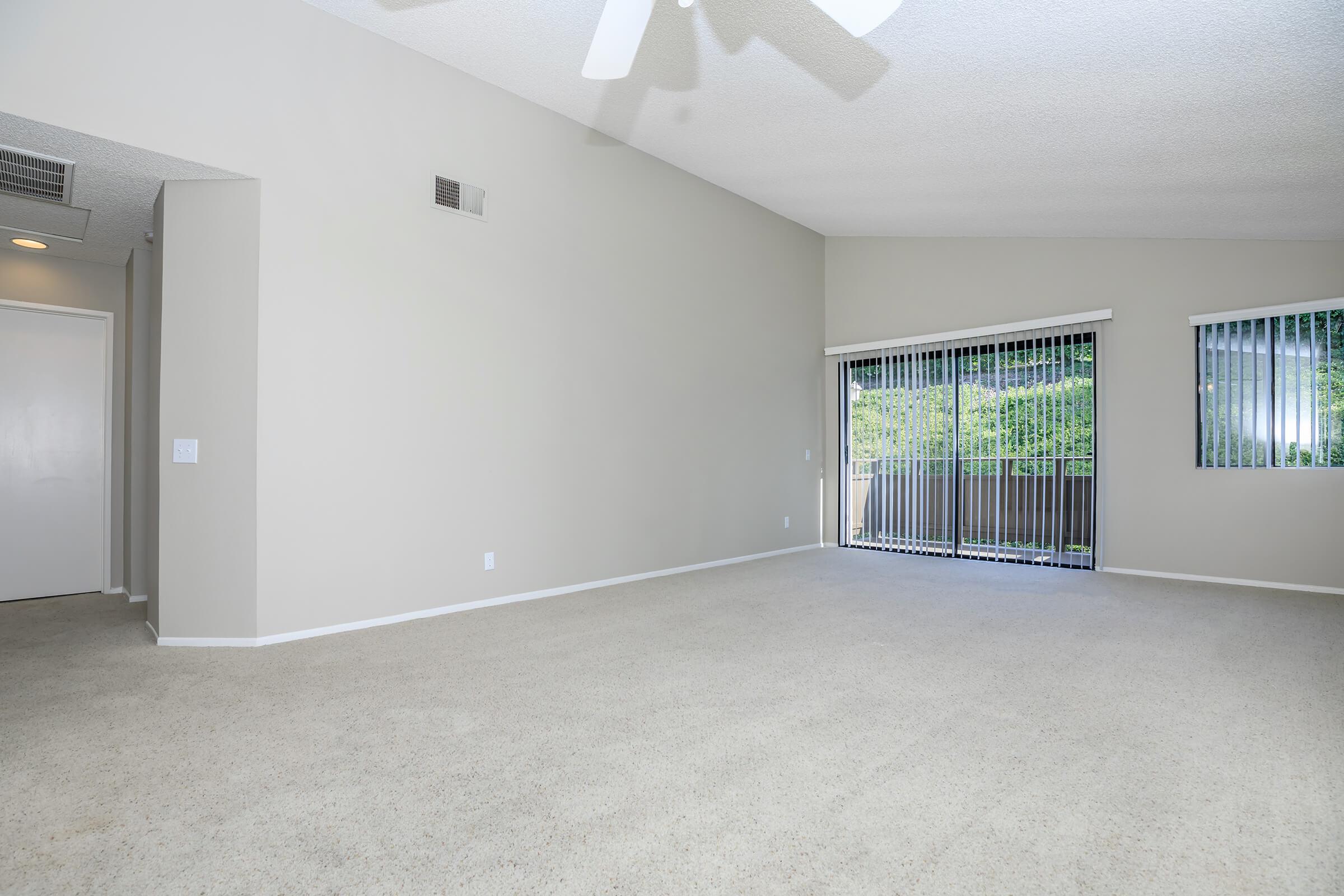 Unfurnished living room with carpet