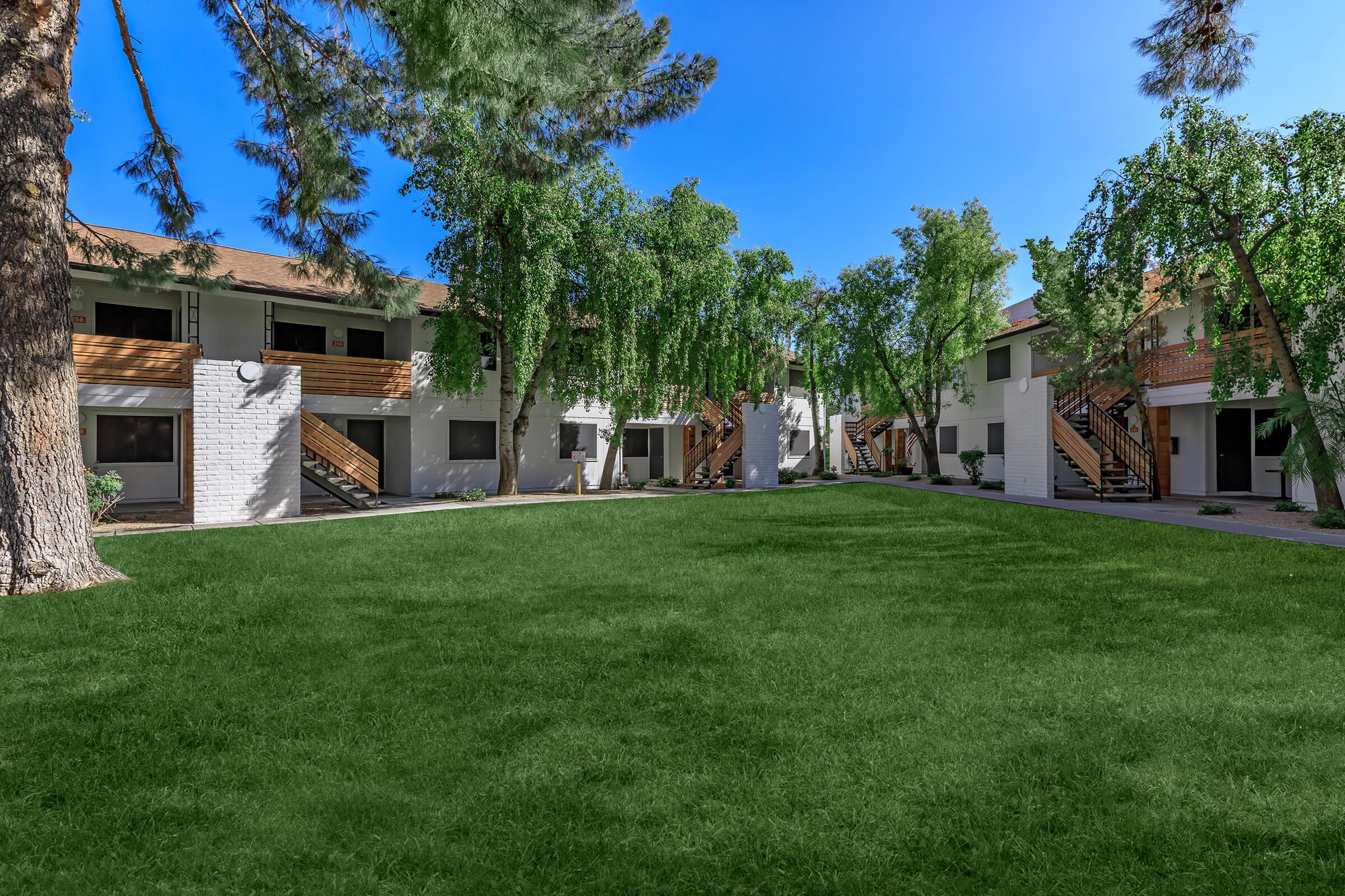 a large lawn in front of a house