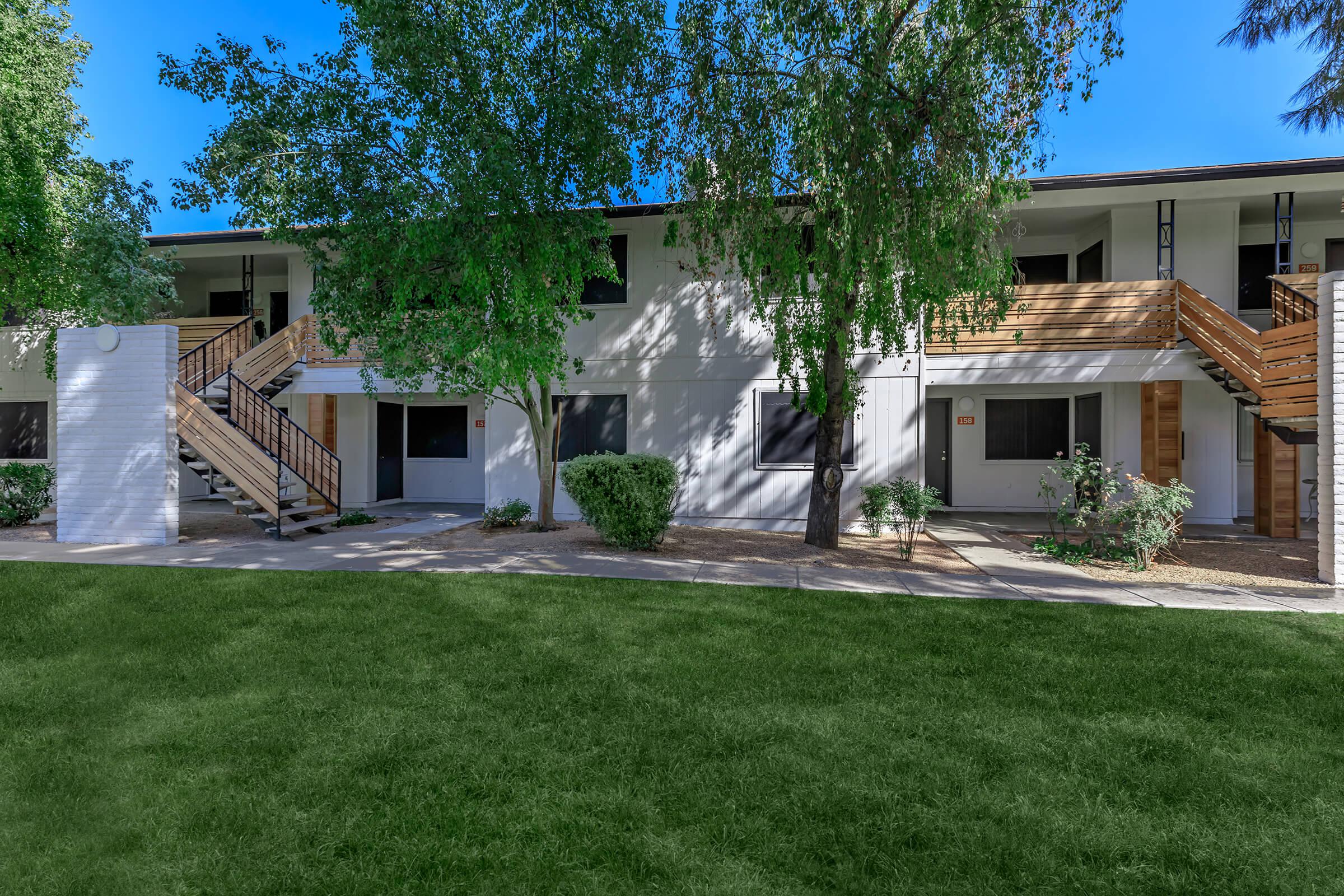 a large lawn in front of a house