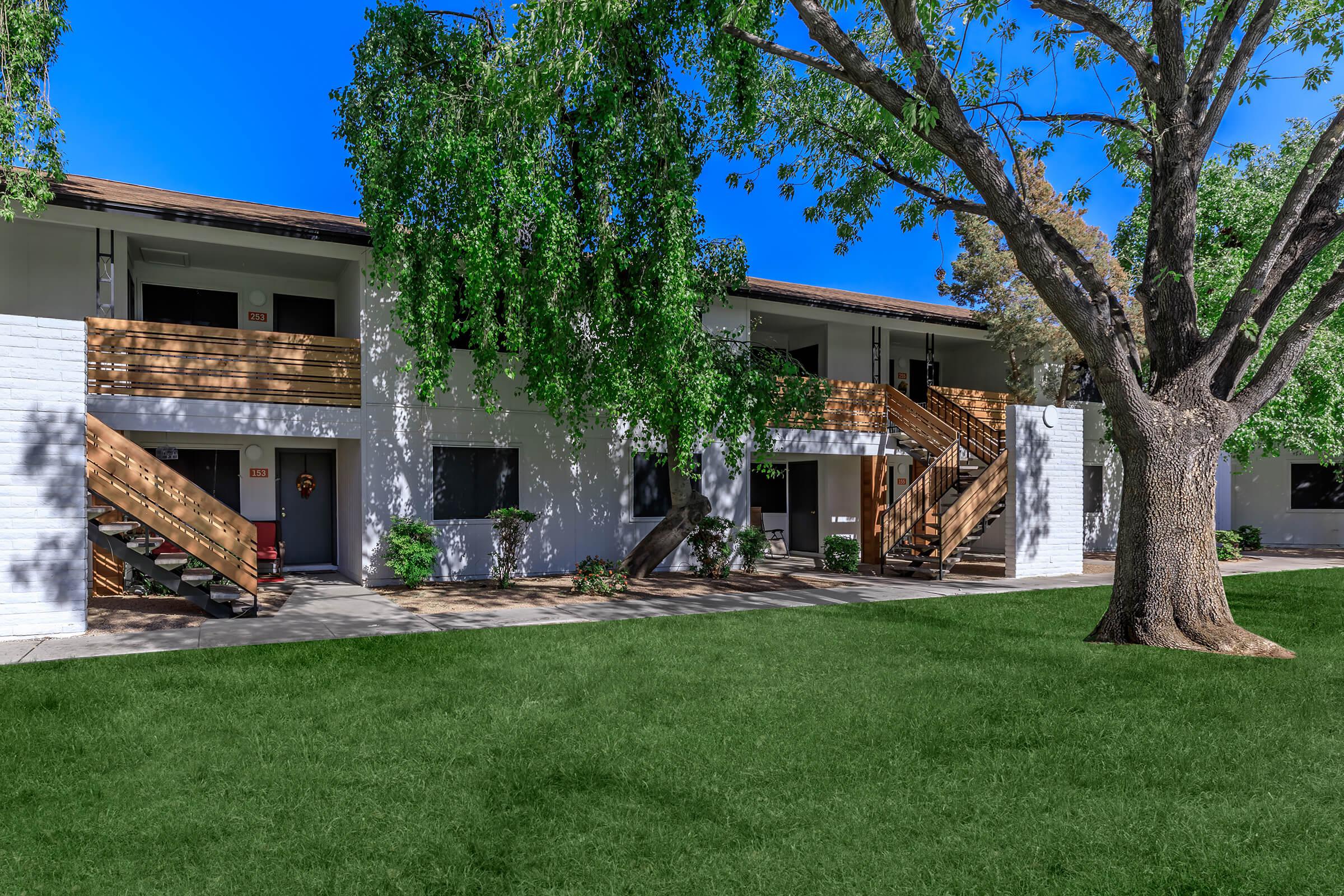 a large lawn in front of a house