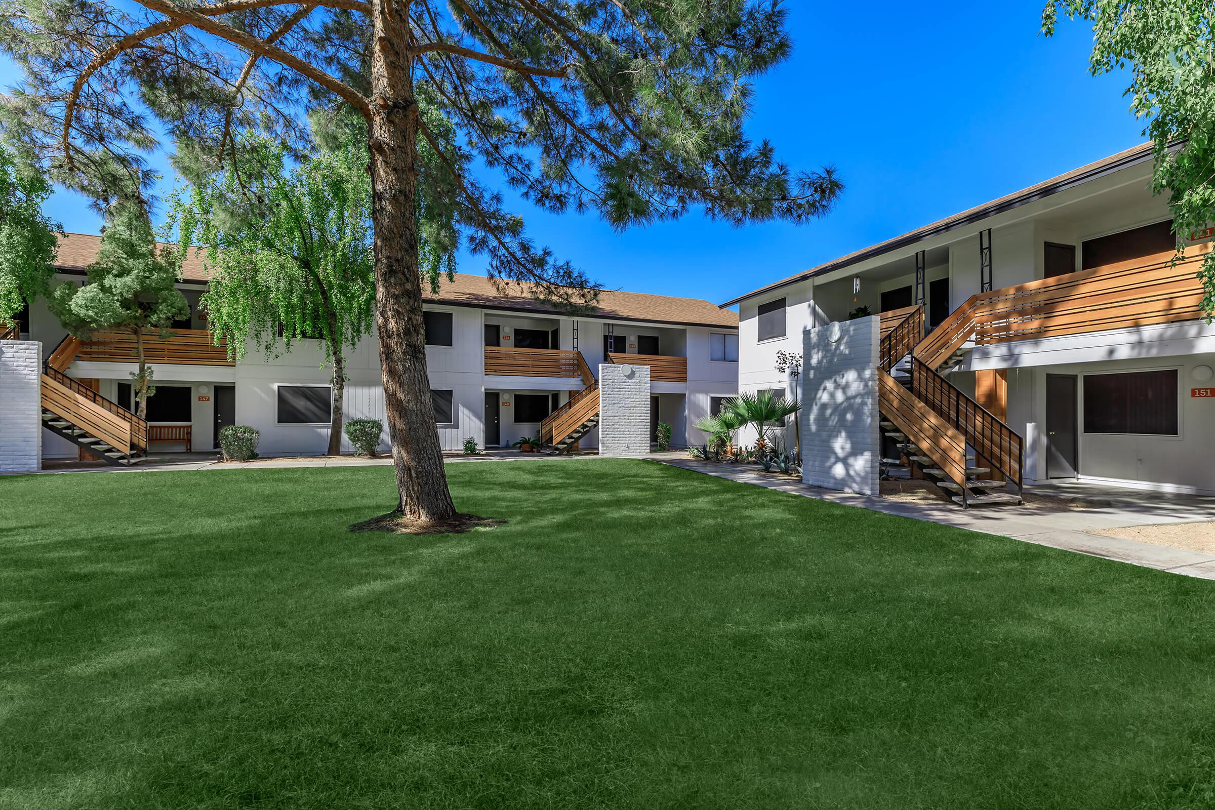 a large lawn in front of a house