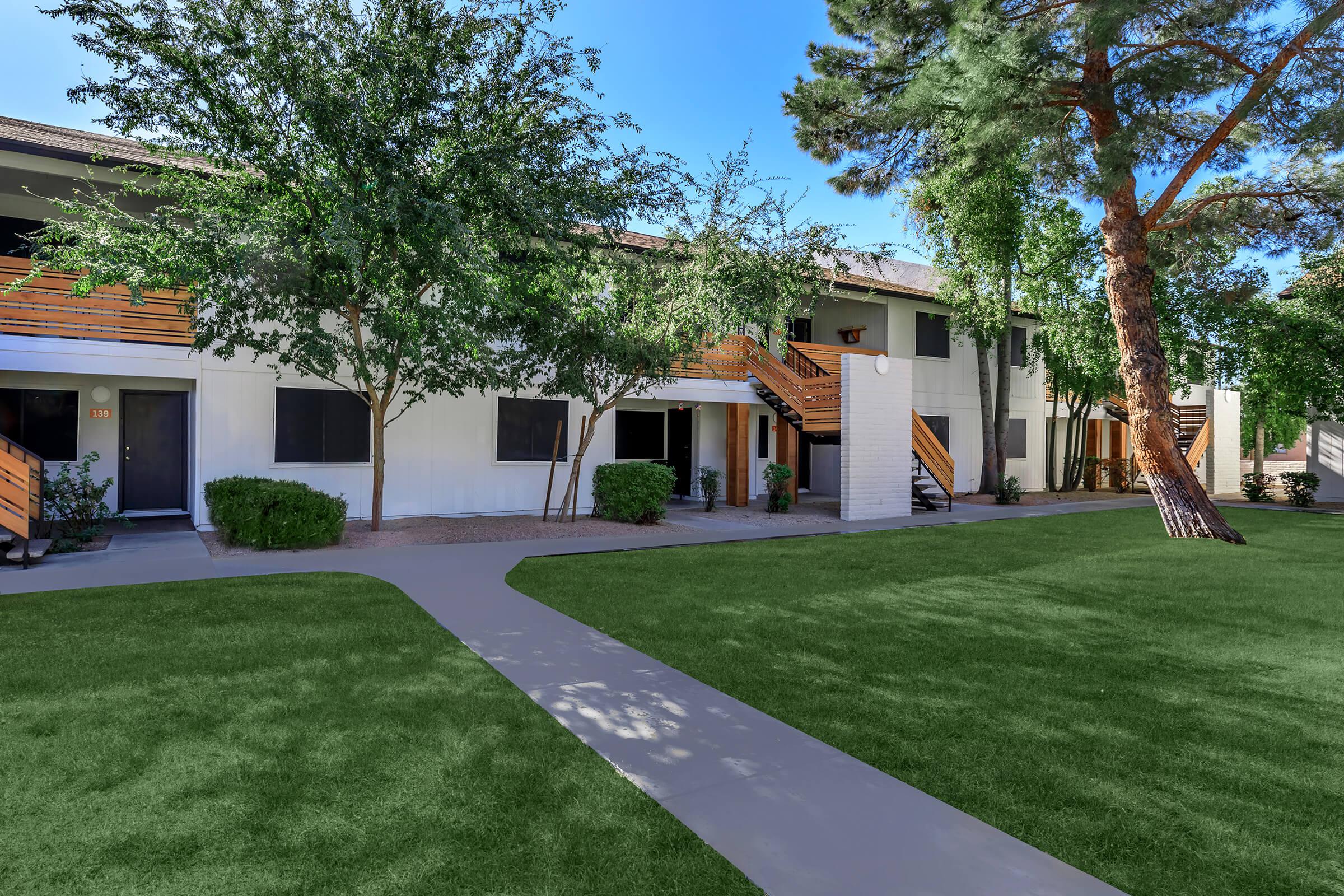 a large lawn in front of a house