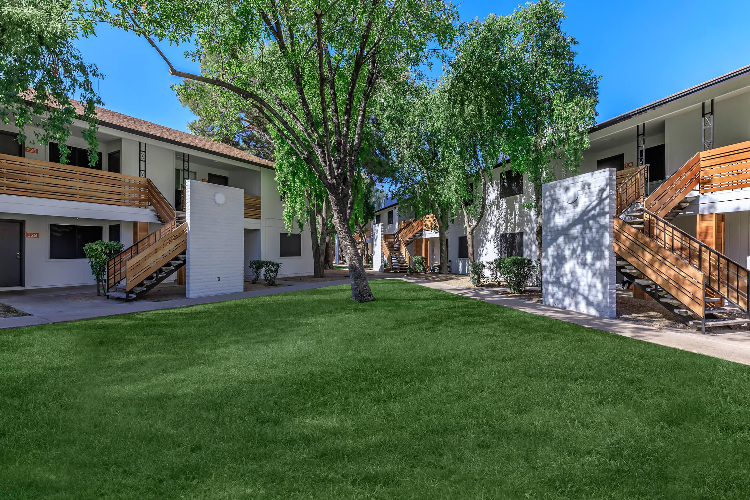 a large lawn in front of a house