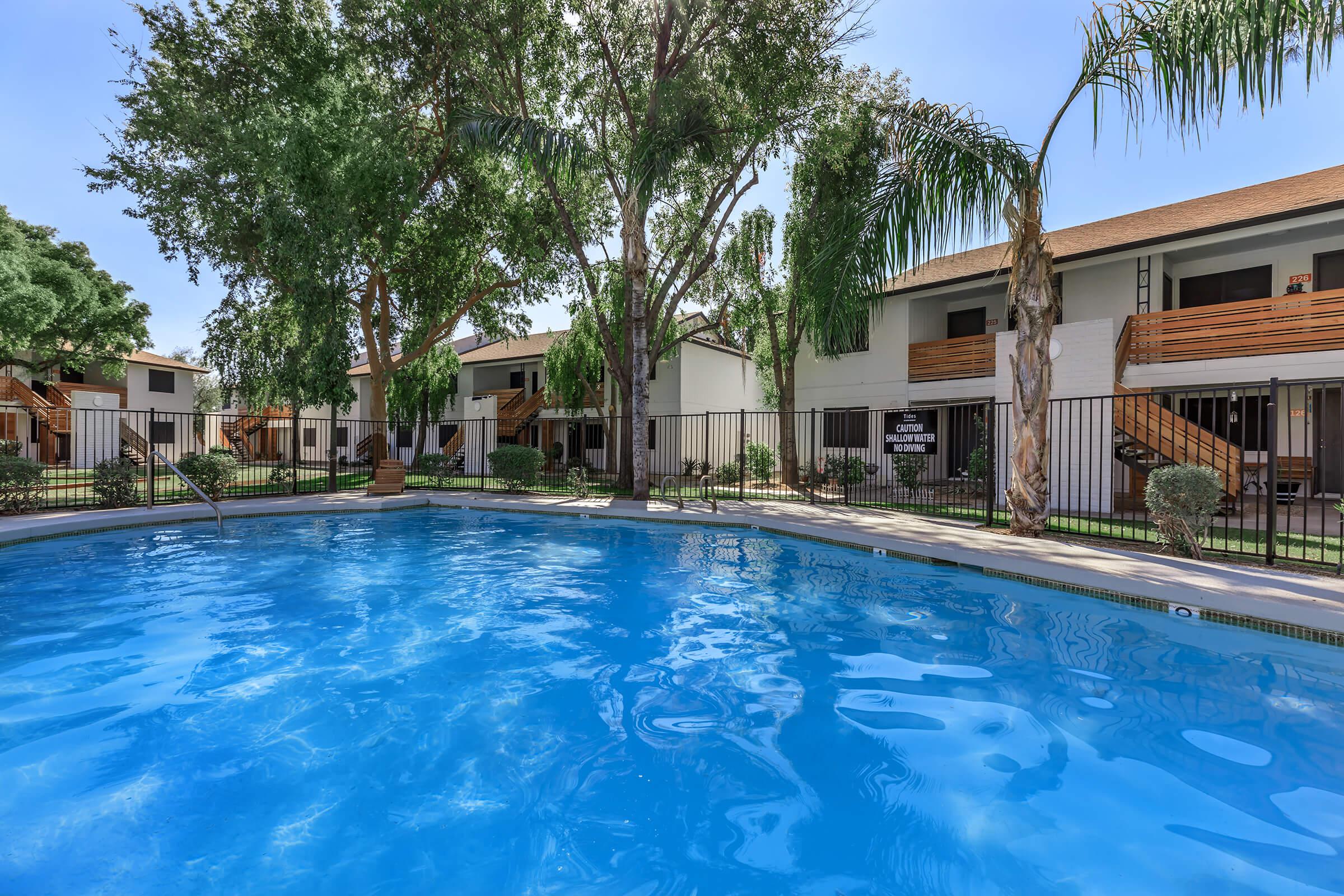 a house with a large pool of water