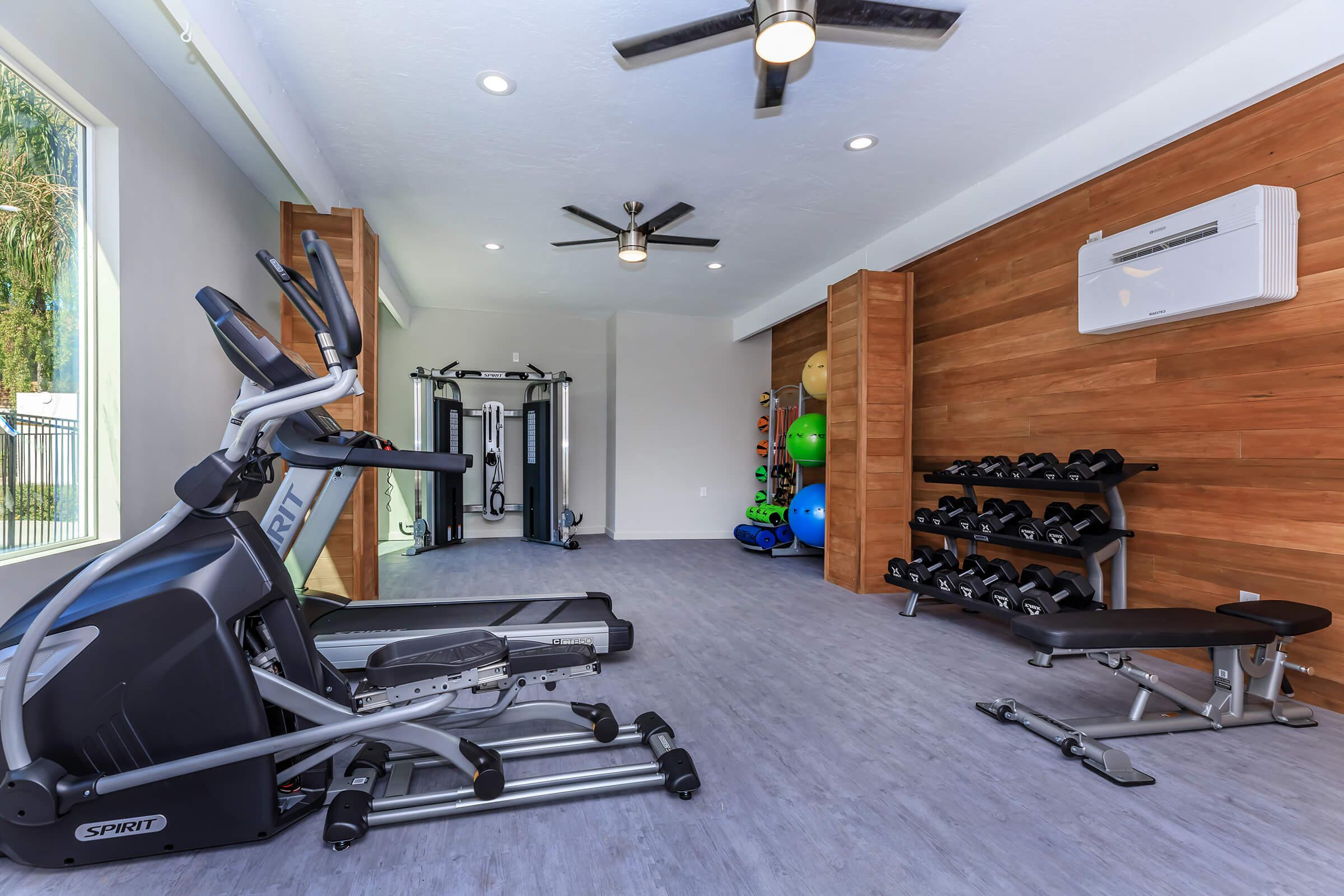 a room filled with furniture and a motorcycle