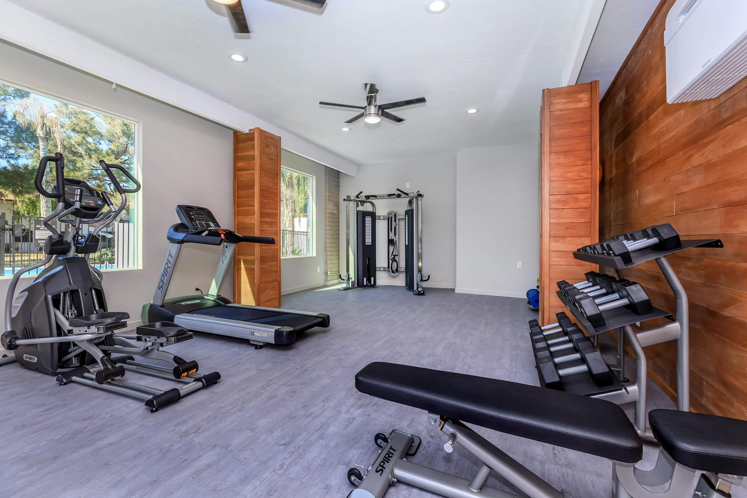 a room filled with furniture and a motorcycle