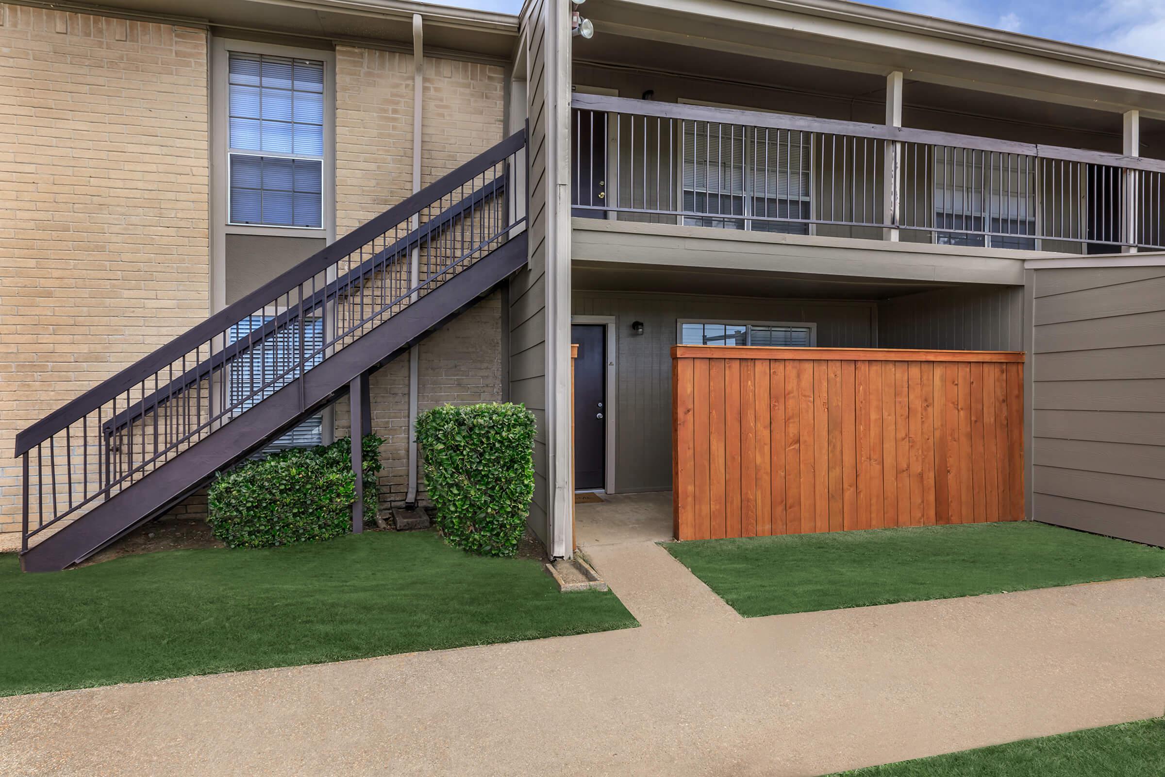 a large lawn in front of a building