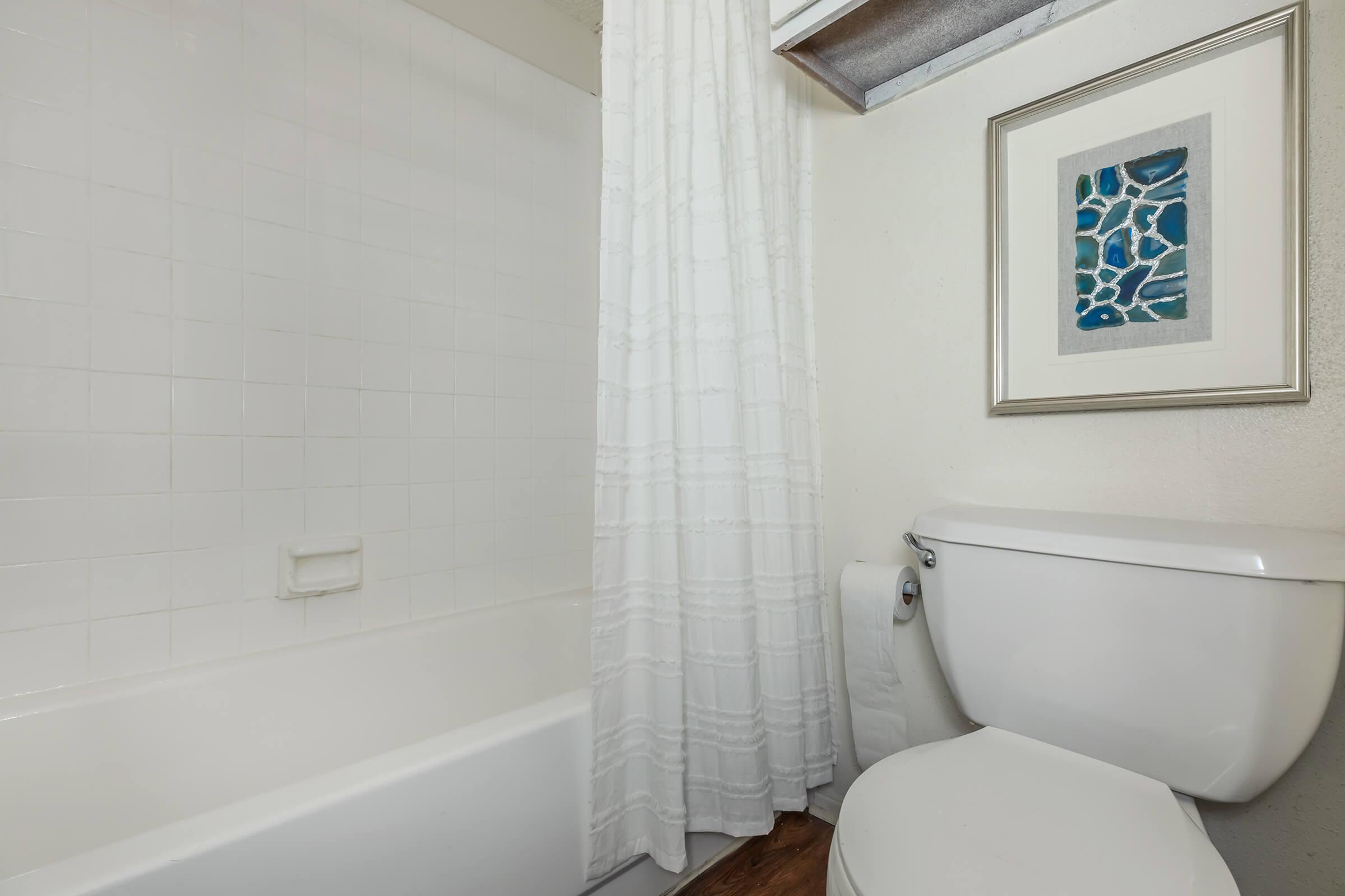 a close up of a shower in a small room