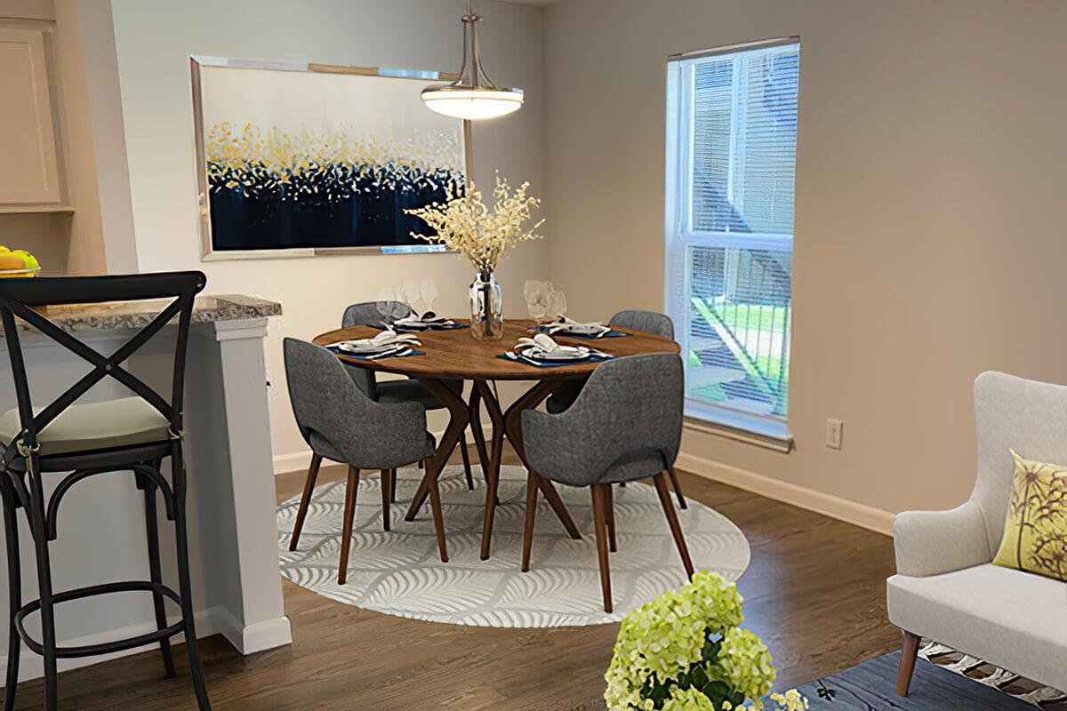 a living room filled with furniture and a table