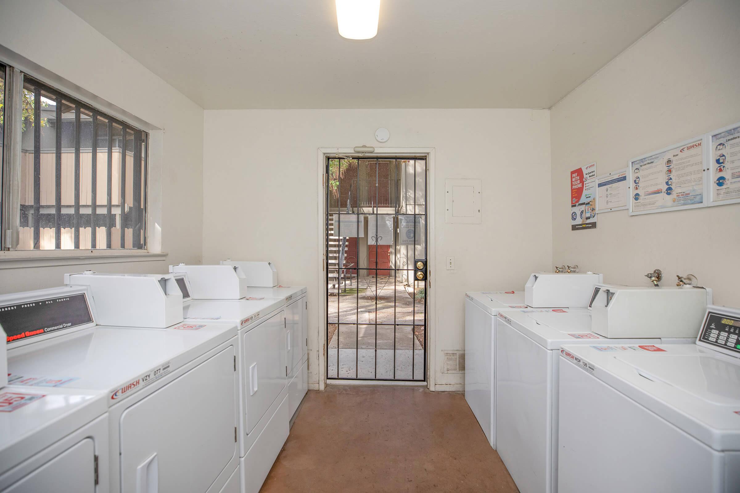 a kitchen with a sink and a window