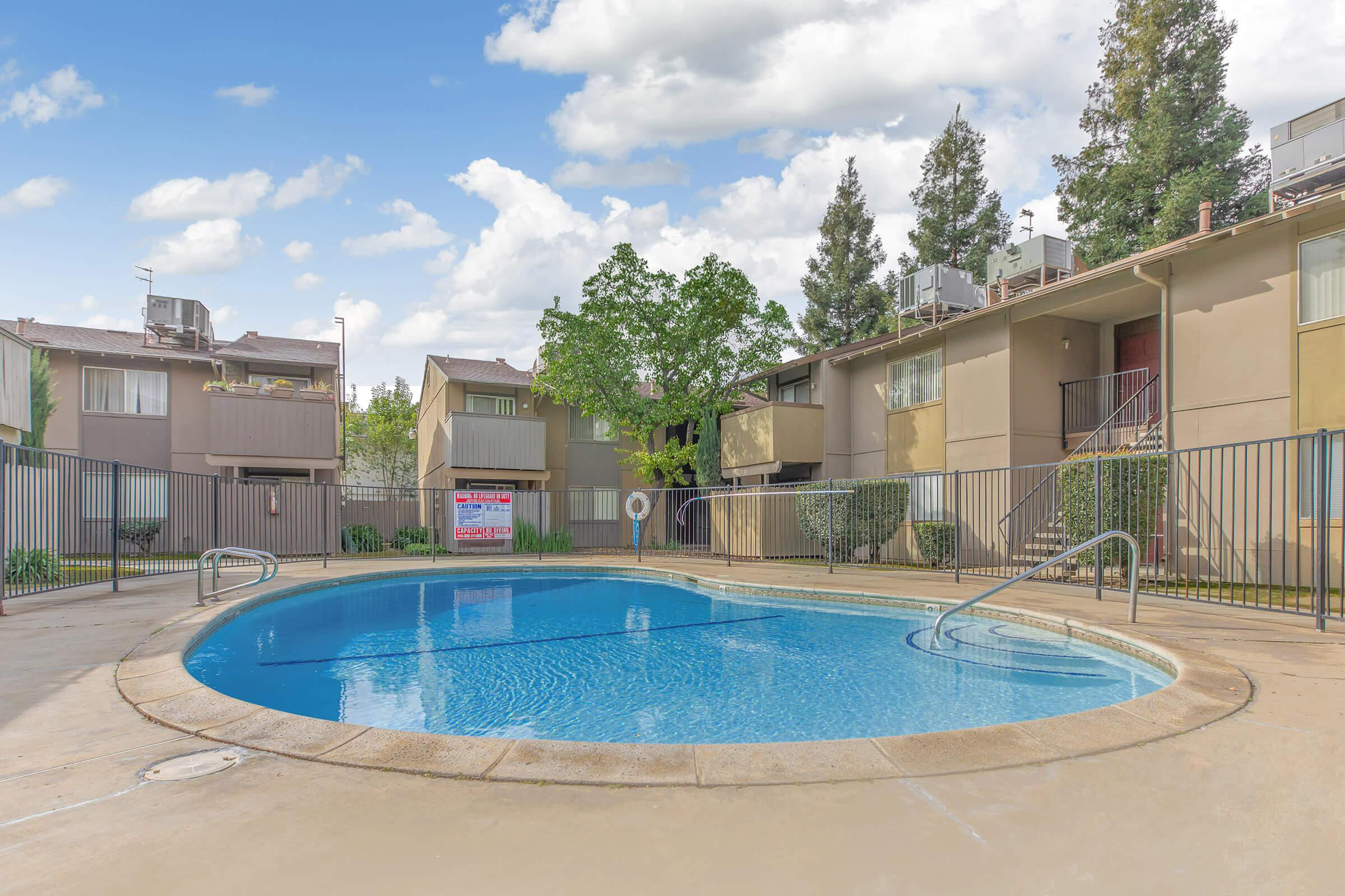 a pool next to a building