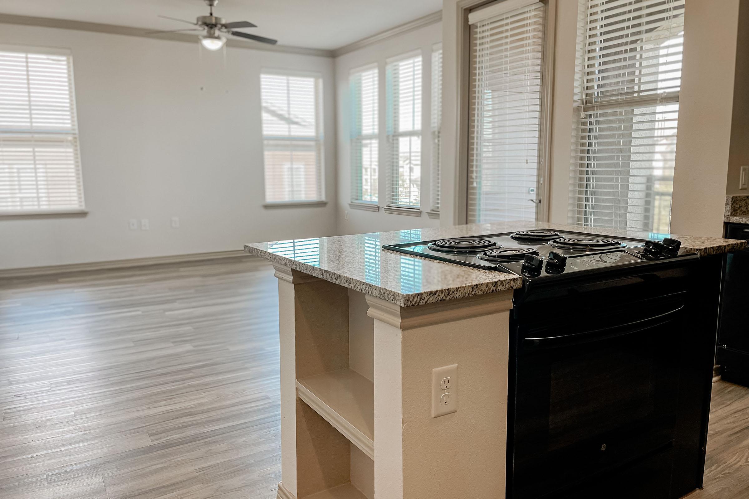 a kitchen with a sink and a window