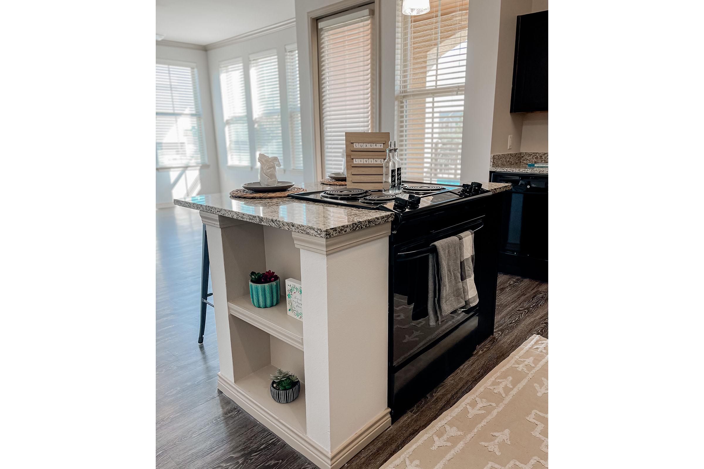 a kitchen with a sink and a window