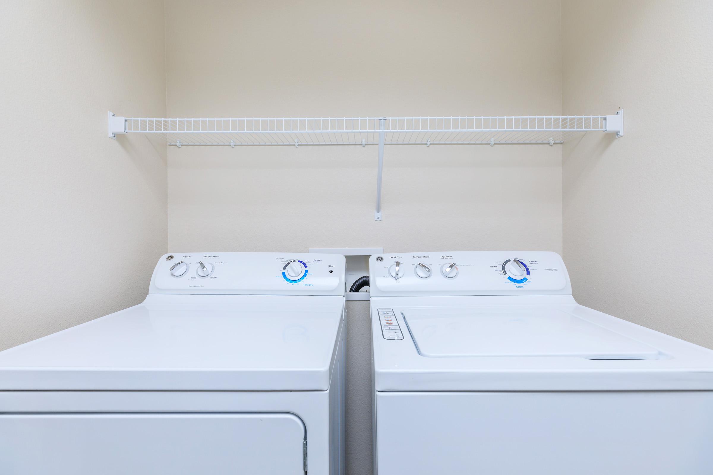 washer and dryer in the laundry room