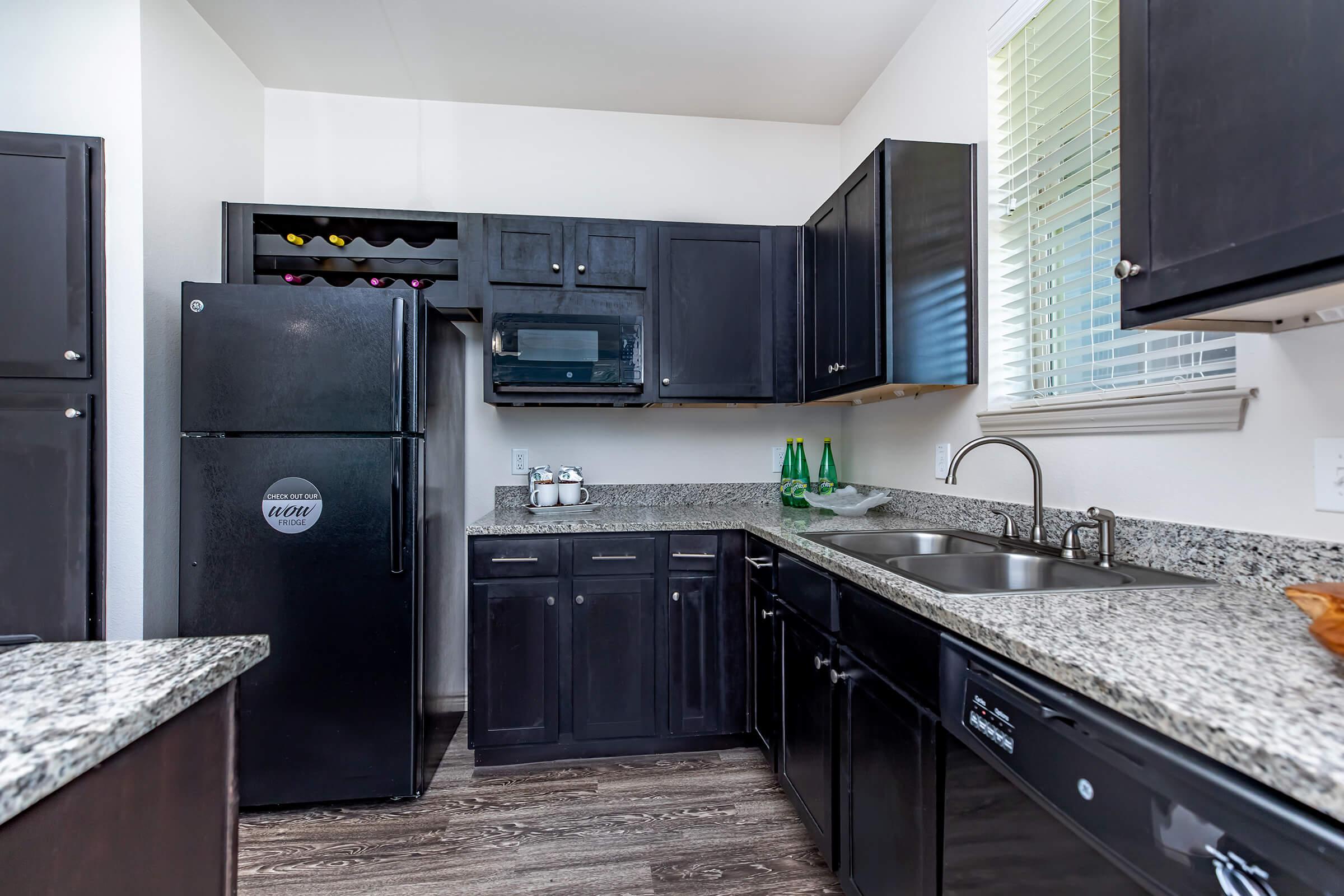 a modern kitchen with stainless steel appliances