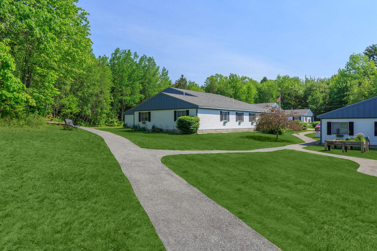 a large lawn in front of a house