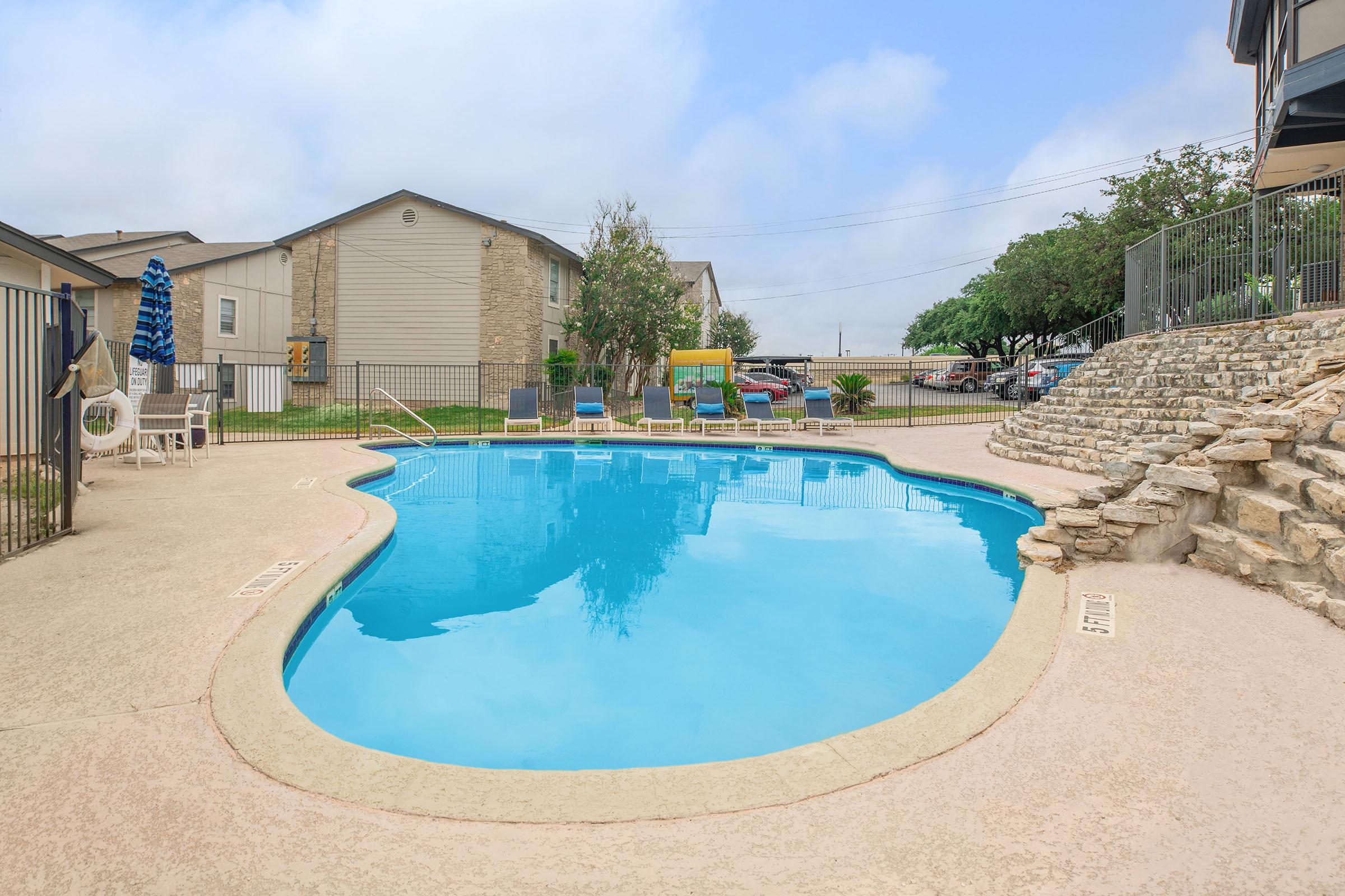 a pool next to a building