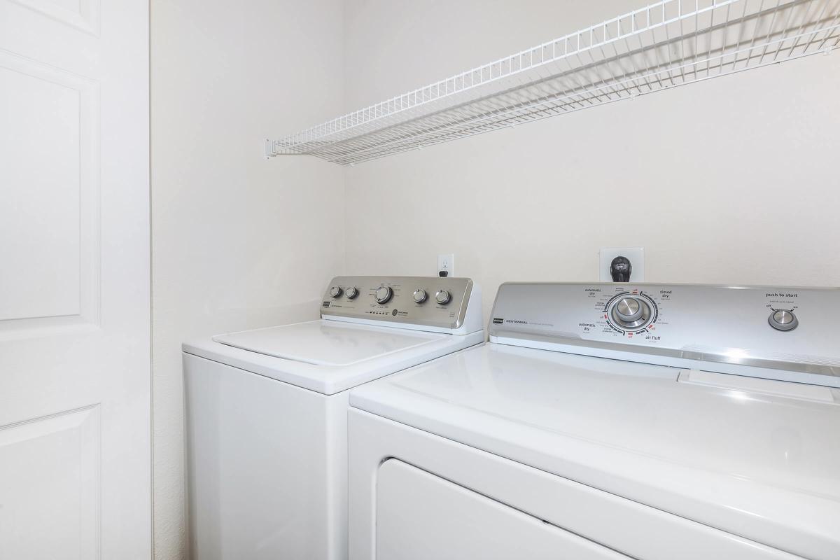 a white refrigerator freezer sitting in a room