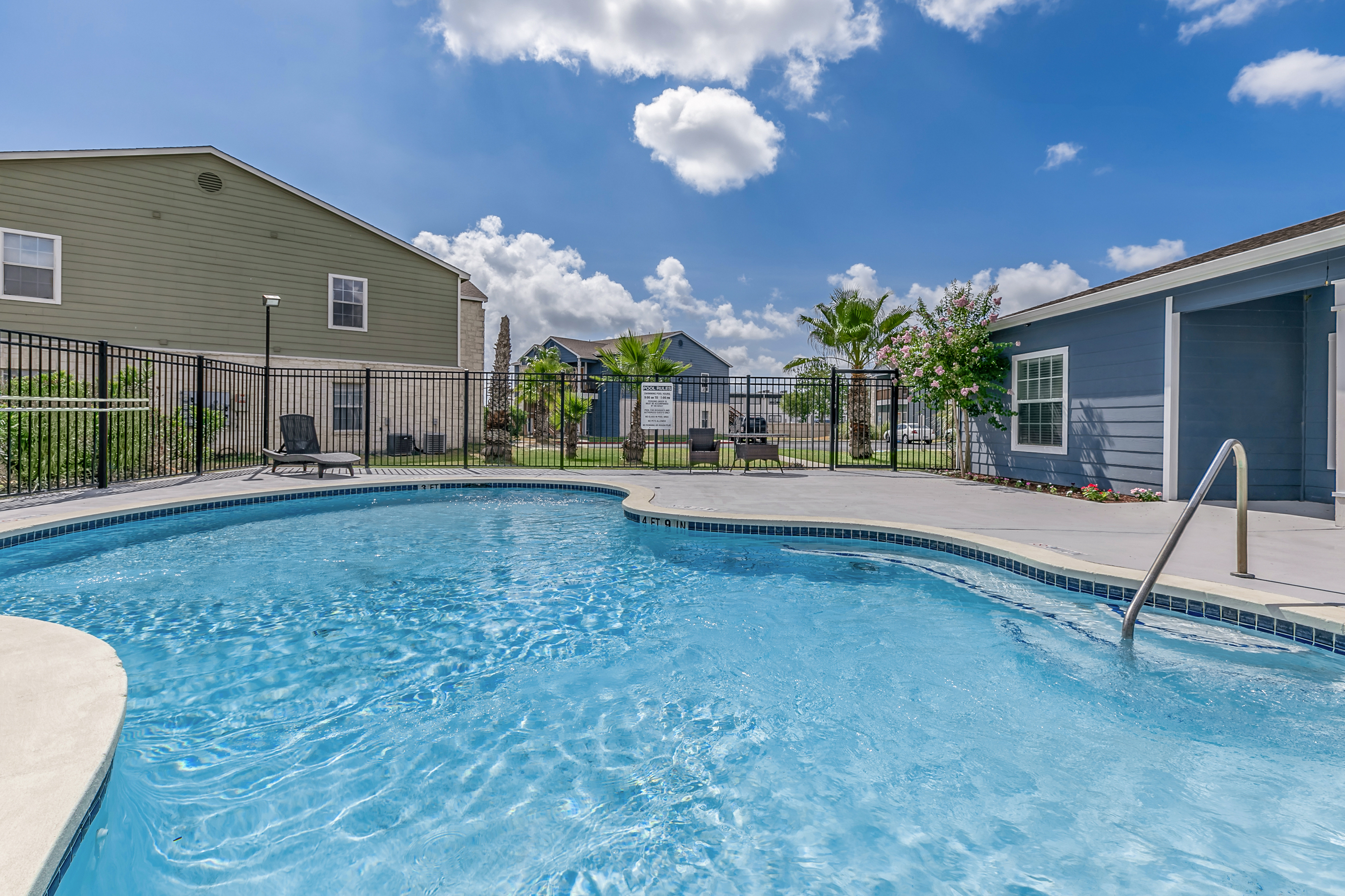 Pool with fence and steps to pool outside office. Portside Villas Apts Ingleside, TX  78362
