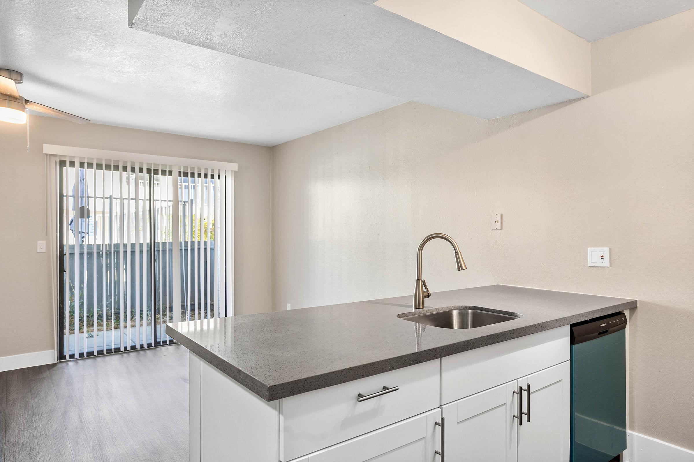 Renovated studio apartment with large kitchen island