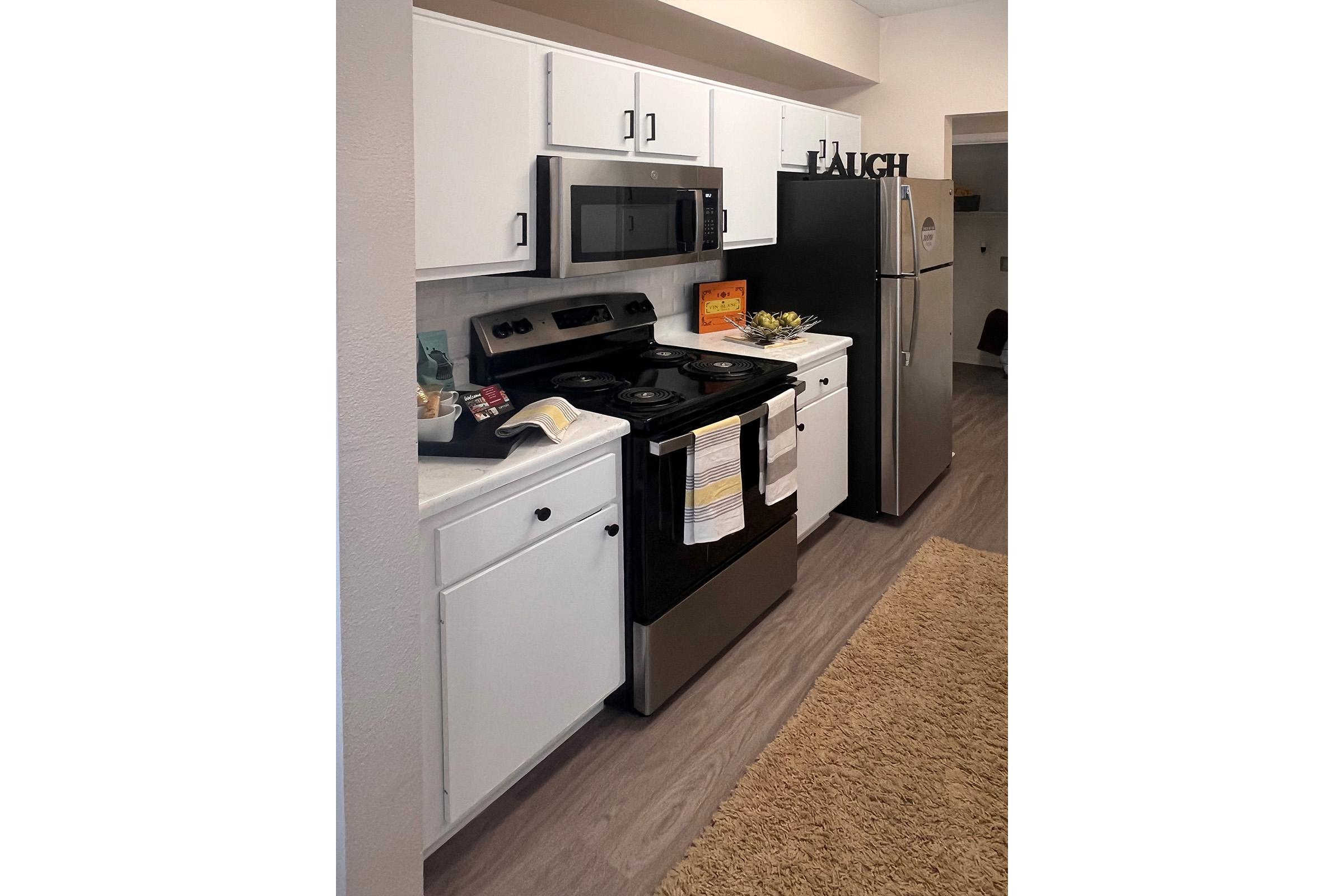 a stainless steel refrigerator in a kitchen