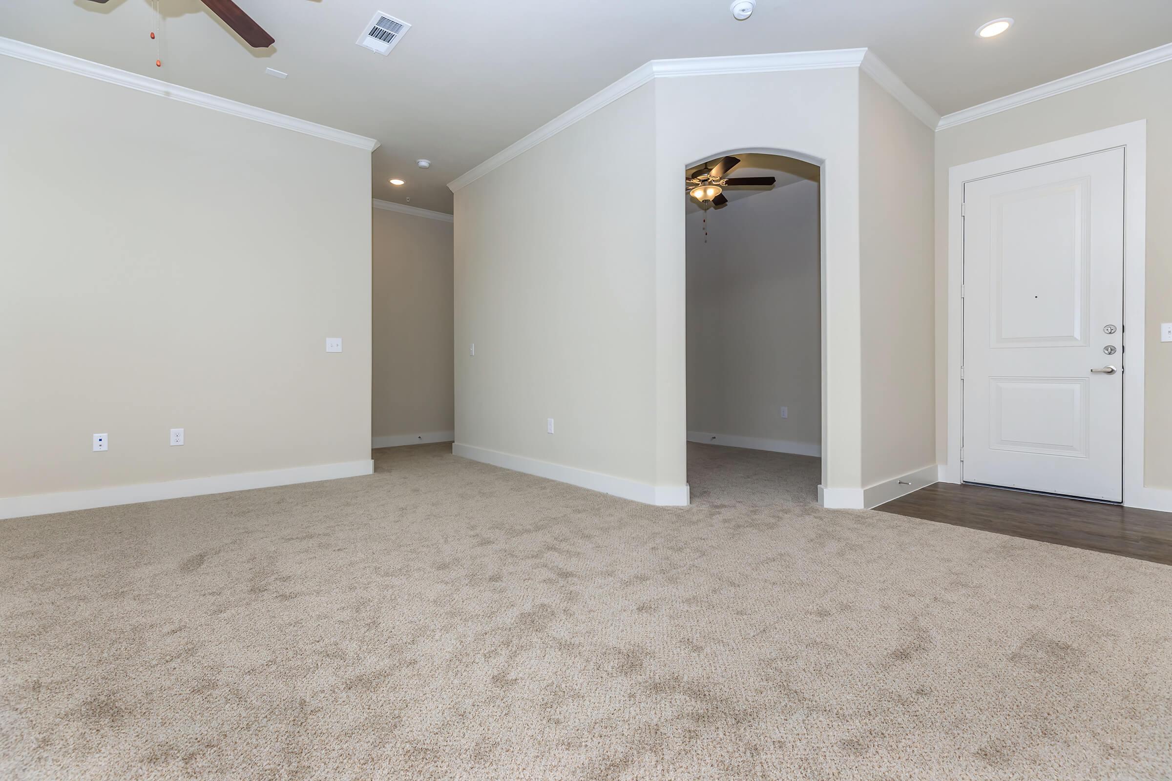 bedroom at ivy point kingwood senior living apartments in kingwood tx featuring carpeted flooring and windows with blinds