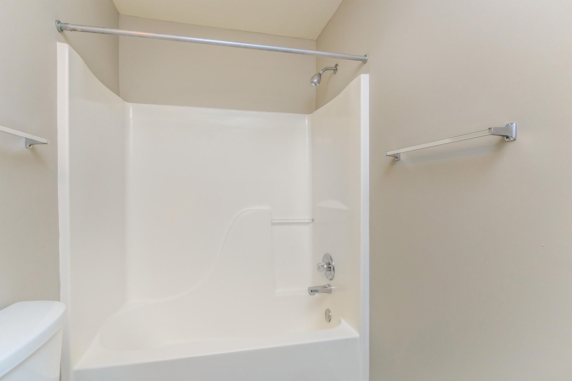 a room with a sink and a shower