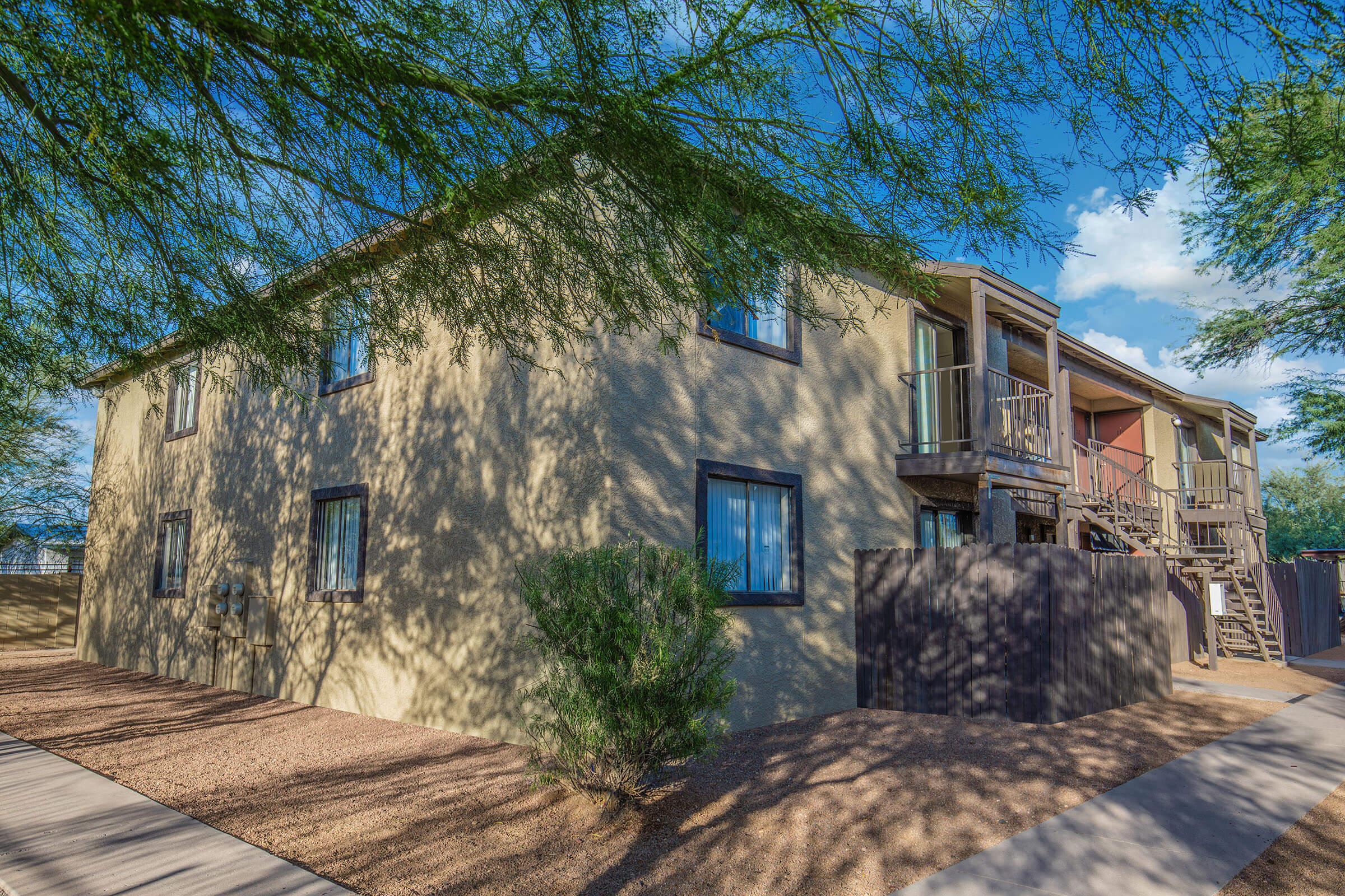 a house with trees in the background