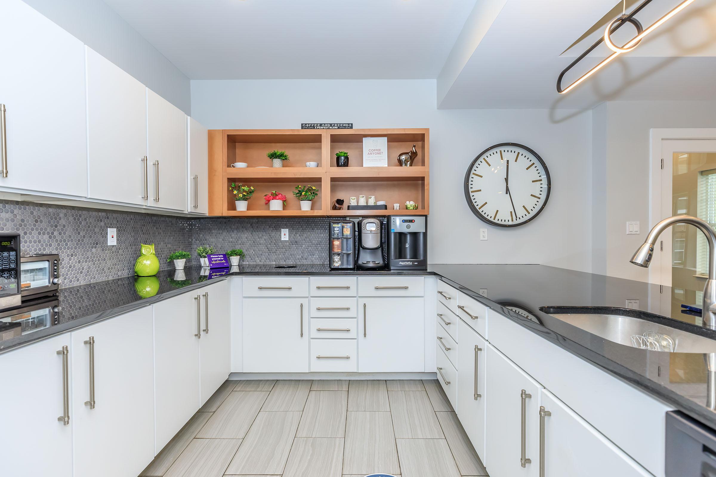 a modern kitchen with stainless steel appliances