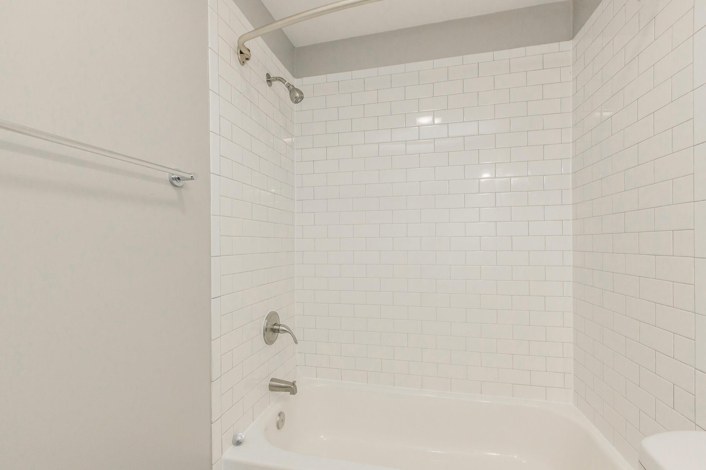 a close up of a sink and a bath tub