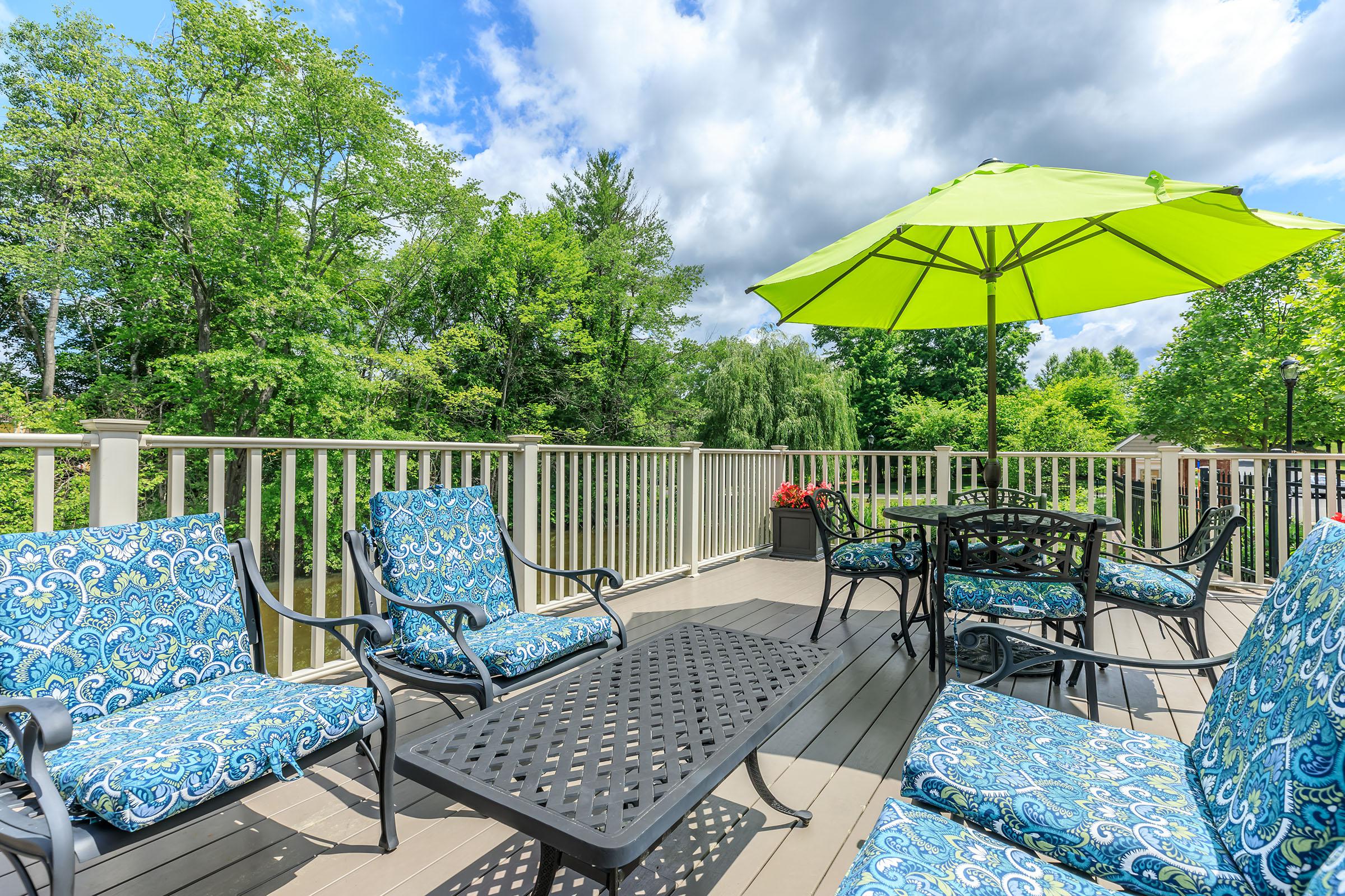 a table topped with a blue umbrella