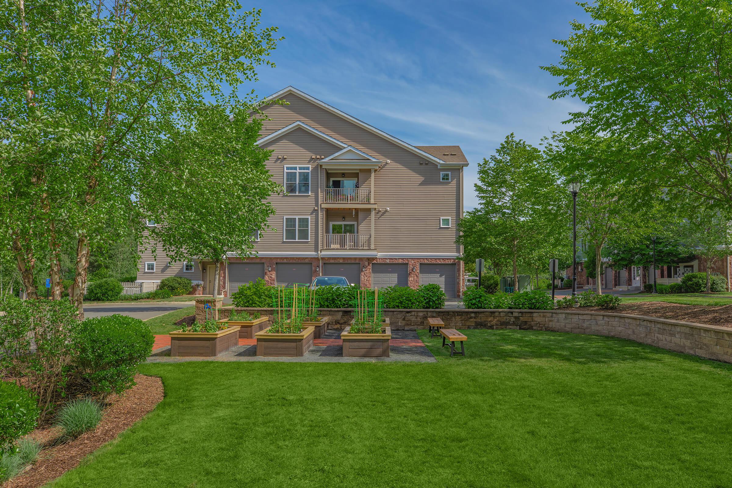 ENJOY THE BEAUTIFUL LANDSCAPING WHILE WORKING IN THE COMMUNITY GARDEN