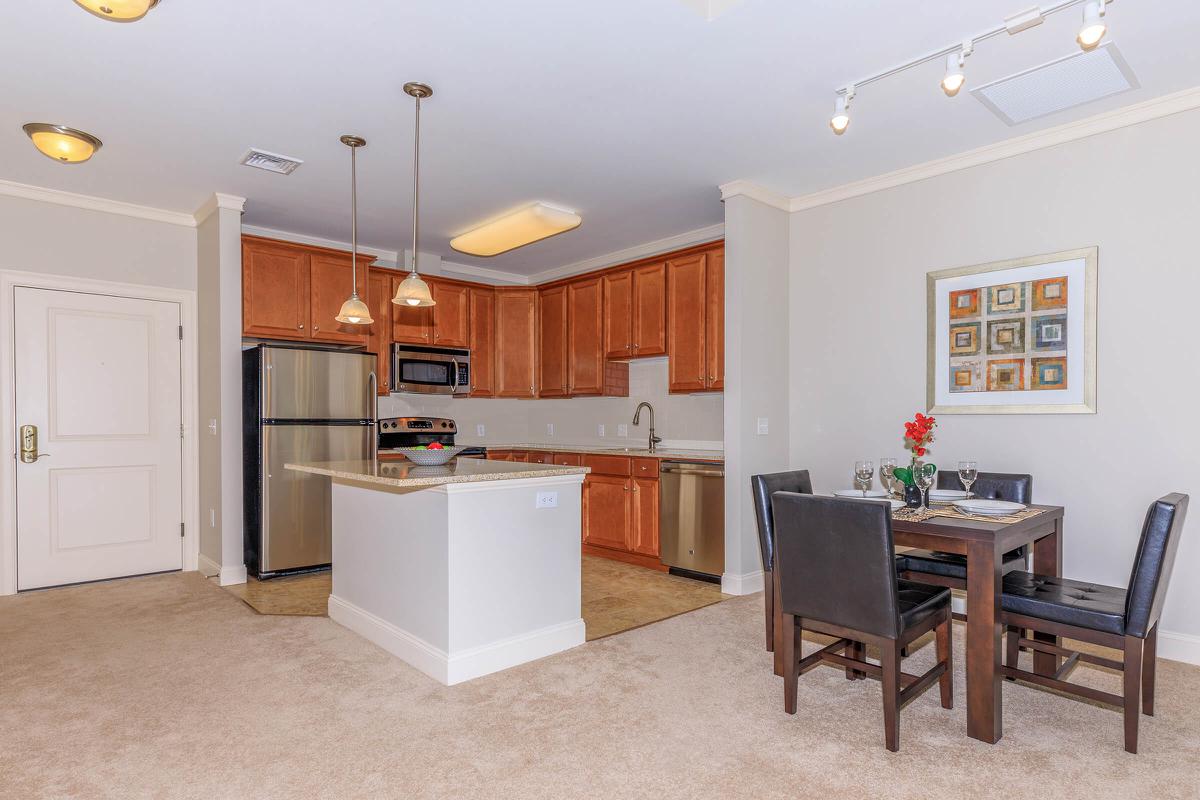 a kitchen with a wooden floor