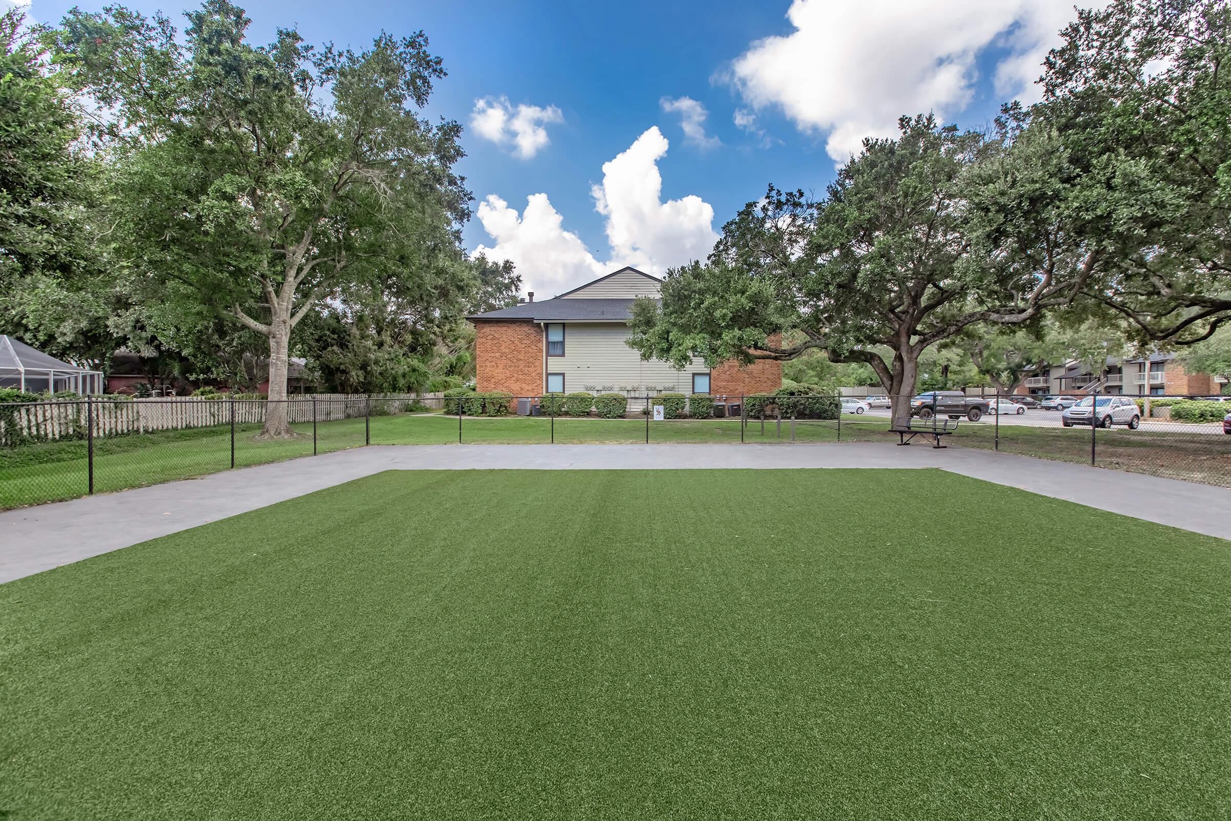 a large lawn in front of a house