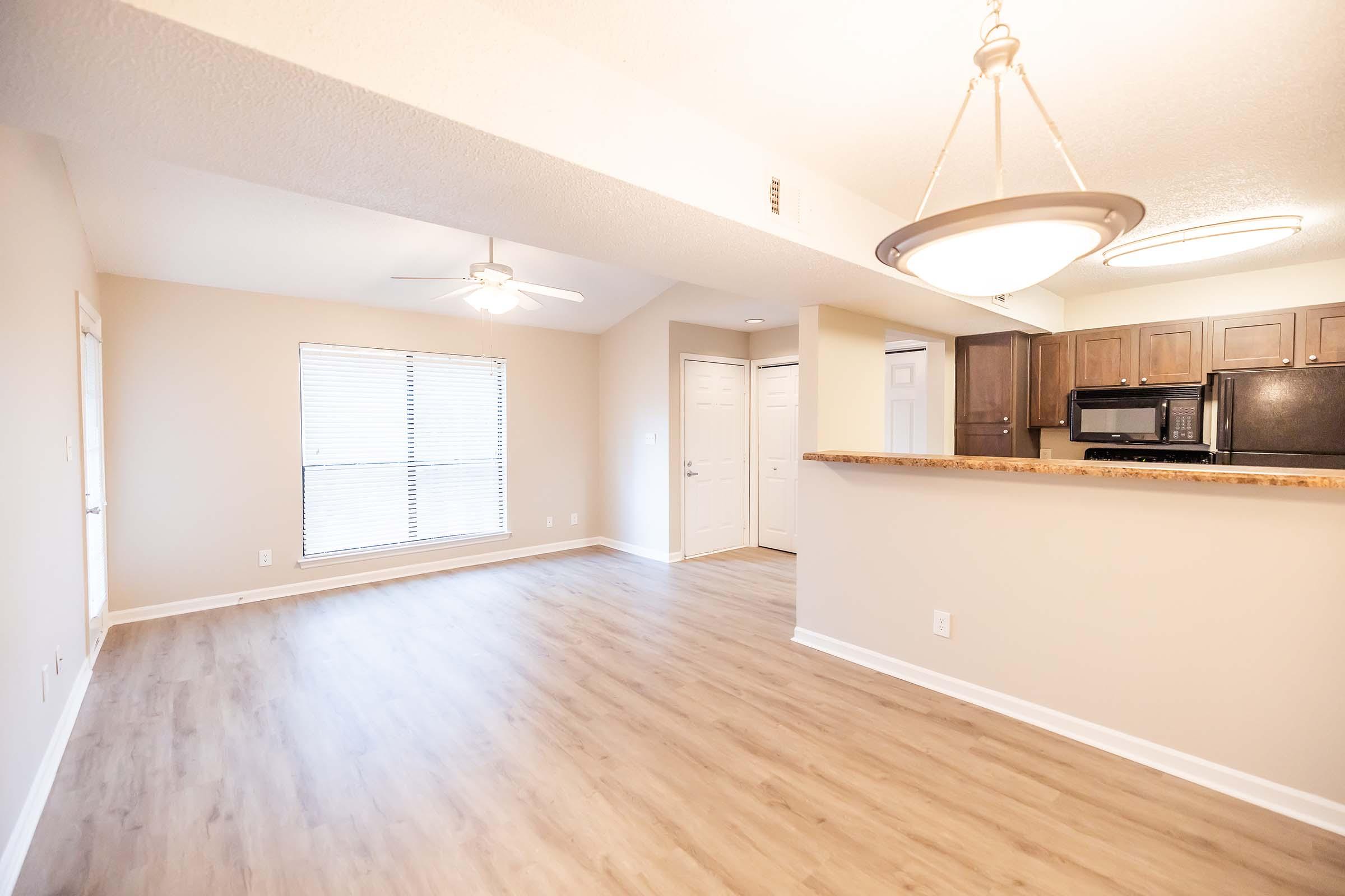 a kitchen with a wood floor