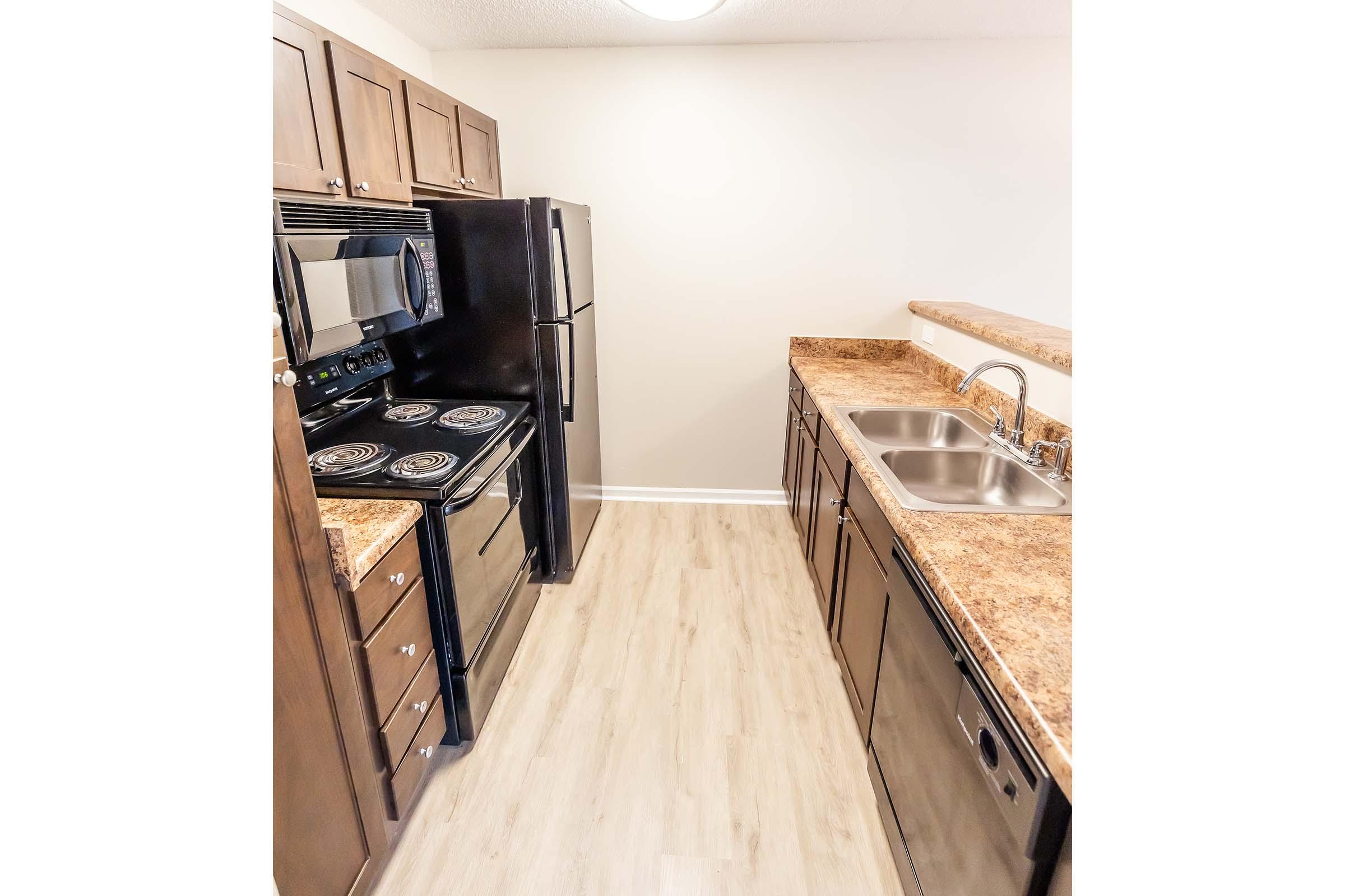 a stove top oven sitting inside of a room