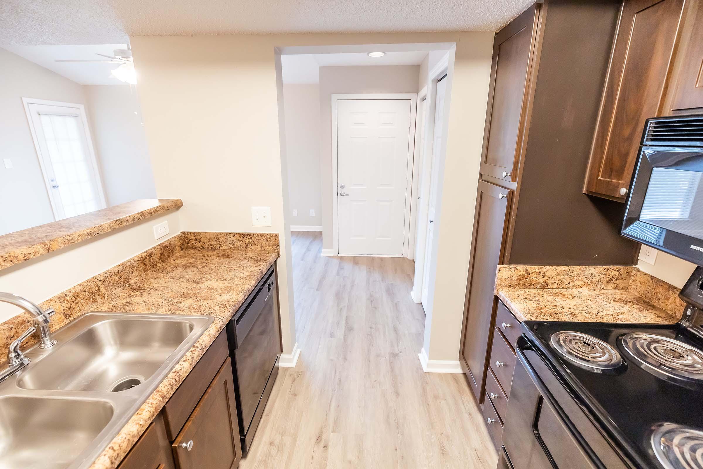 a stove top oven sitting inside of a room