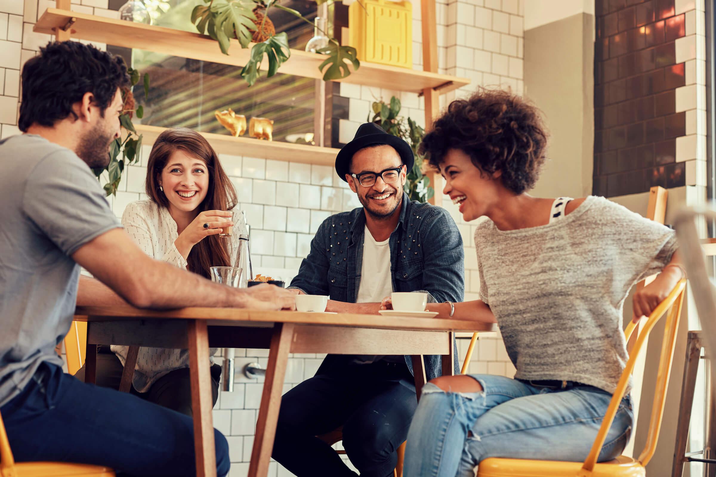 a group of people sitting at a table