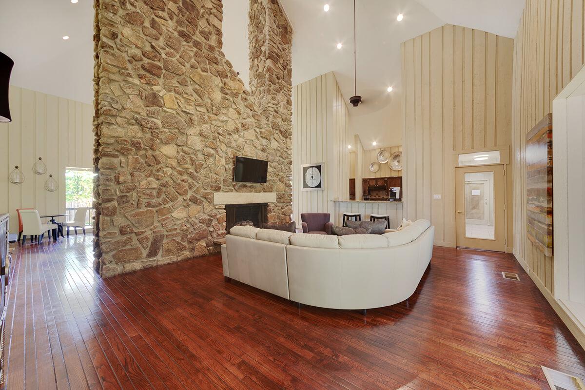 a view of a living room with a wood floor